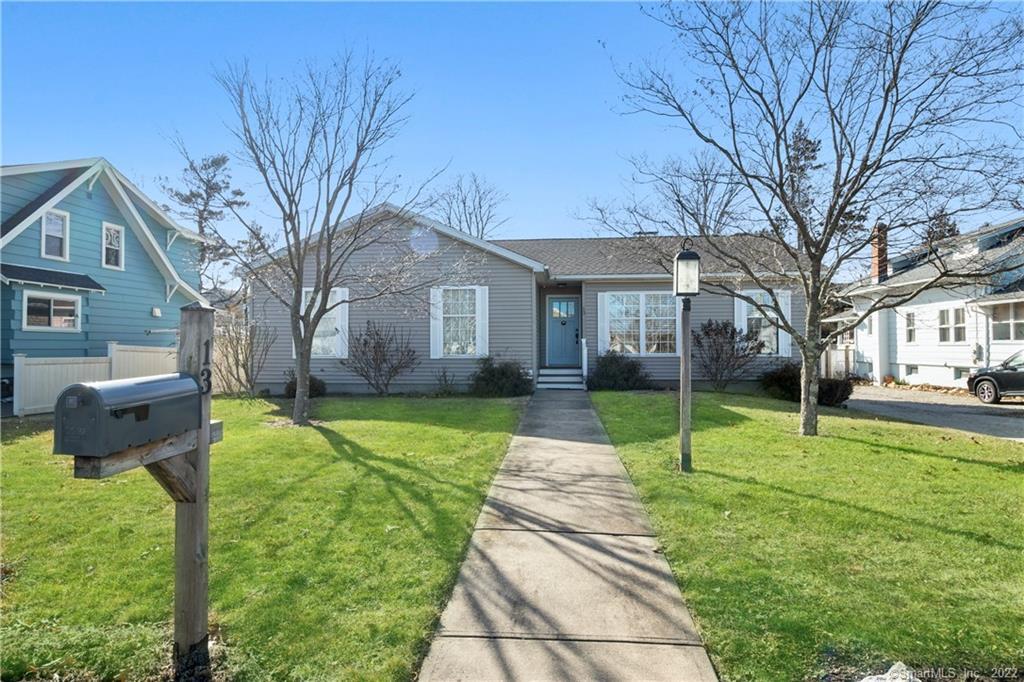 13 Wilford Road Branford, CT 06405 - Photo 1 of 1 a house that has a tree in front of it