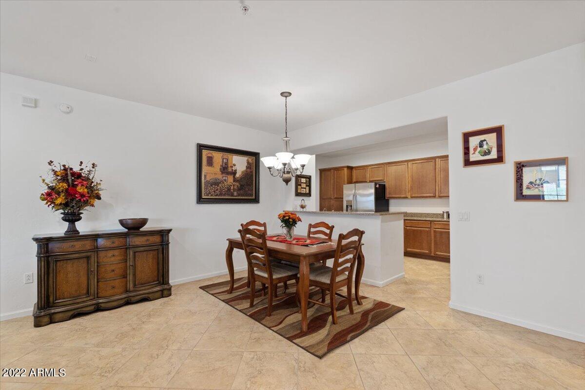 3935 East Rough Rider Road, Unit 1063 Phoenix, AZ 85050 - Photo 11 of 51 11-Dining Room