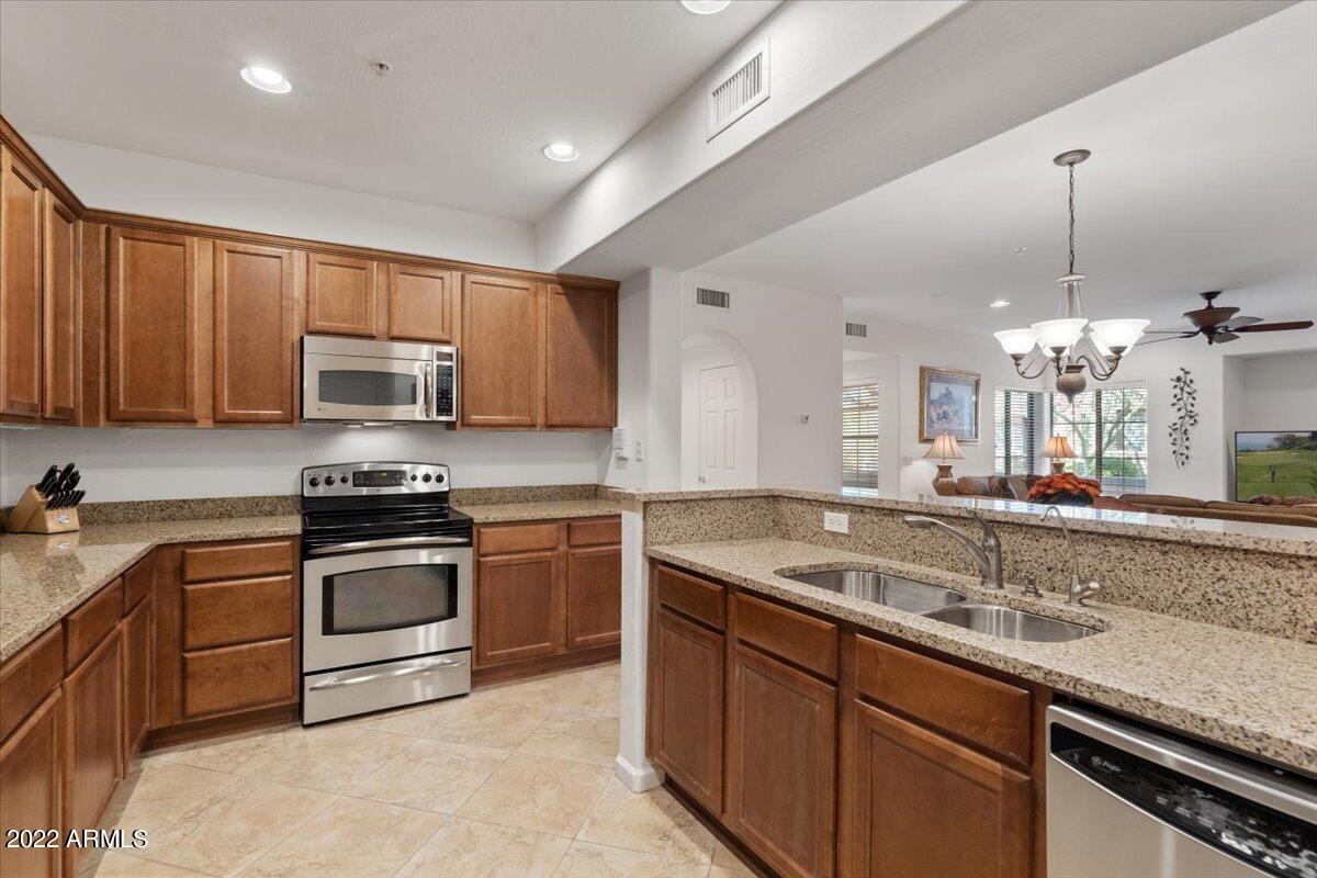 3935 East Rough Rider Road, Unit 1063 Phoenix, AZ 85050 - Photo 12 of 51 12-Kitchen