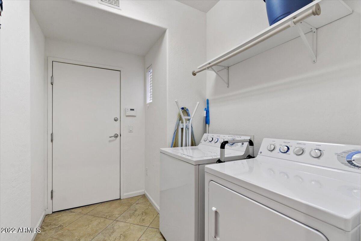 3935 East Rough Rider Road, Unit 1063 Phoenix, AZ 85050 - Photo 24 of 51 24-Laundry