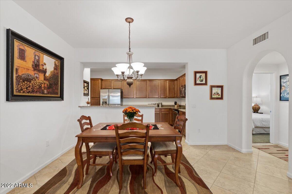 3935 East Rough Rider Road, Unit 1063 Phoenix, AZ 85050 - Photo 10 of 51 10-Dining Room