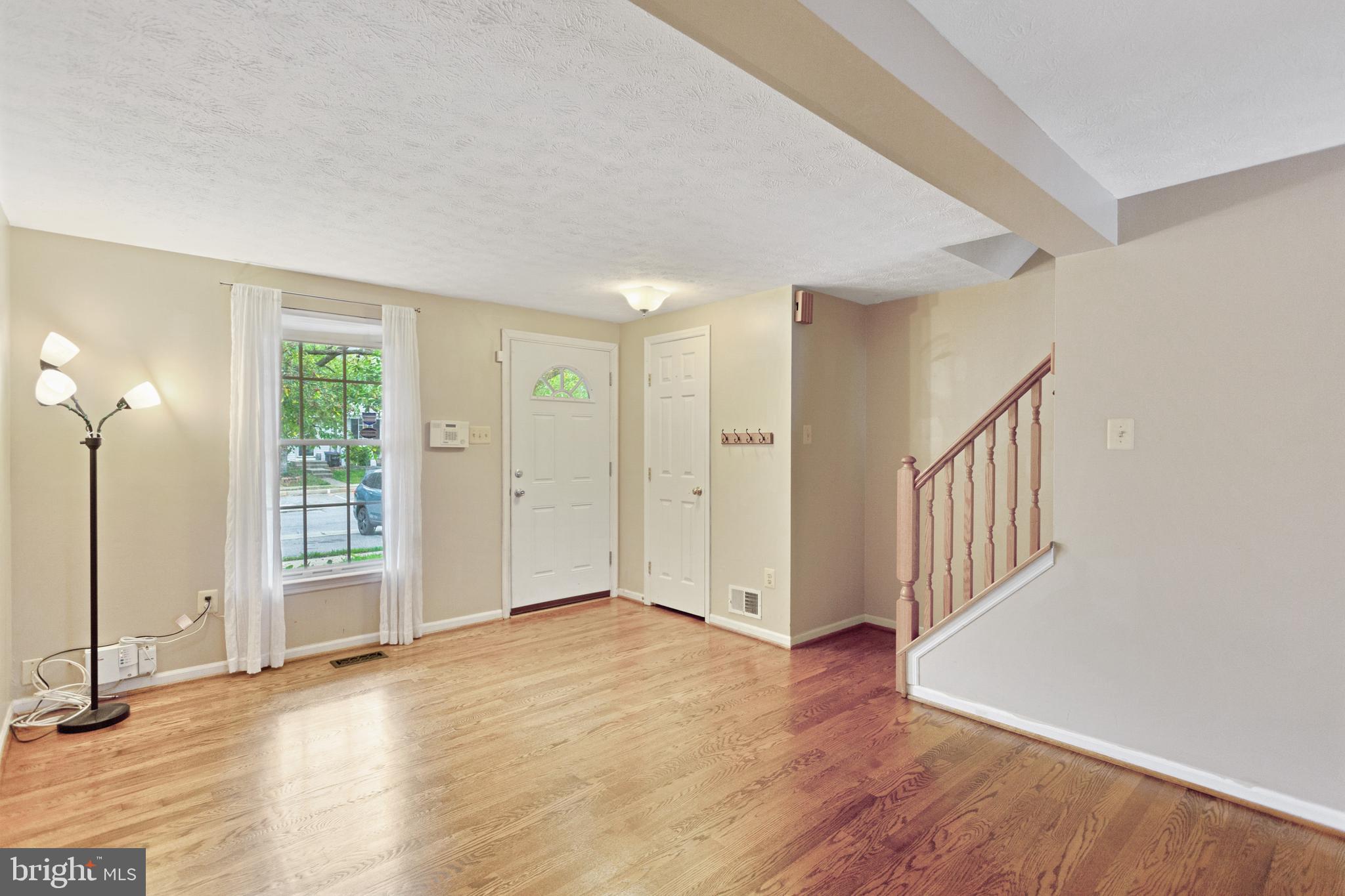 2225 Riding Crop Way Baltimore, MD 21244 - Photo 5 of 29 Light & bright living room/dining room area