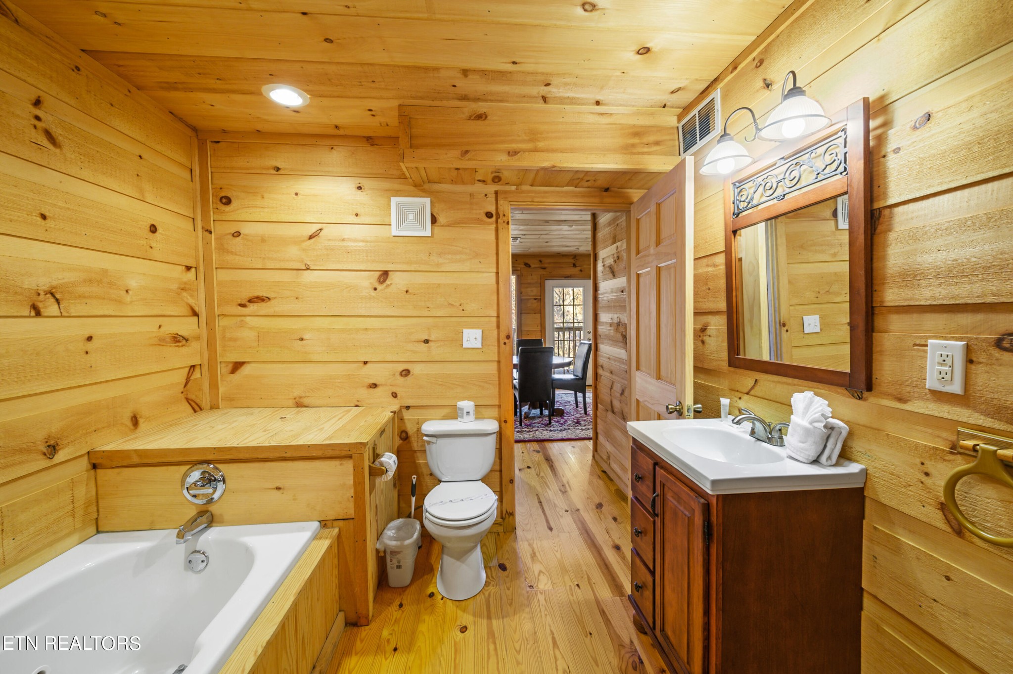2505 Wildcat Ridge Road Sevierville, TN 37862 - Photo 14 of 48 a bathroom with a sink mirror bathtub and toilet