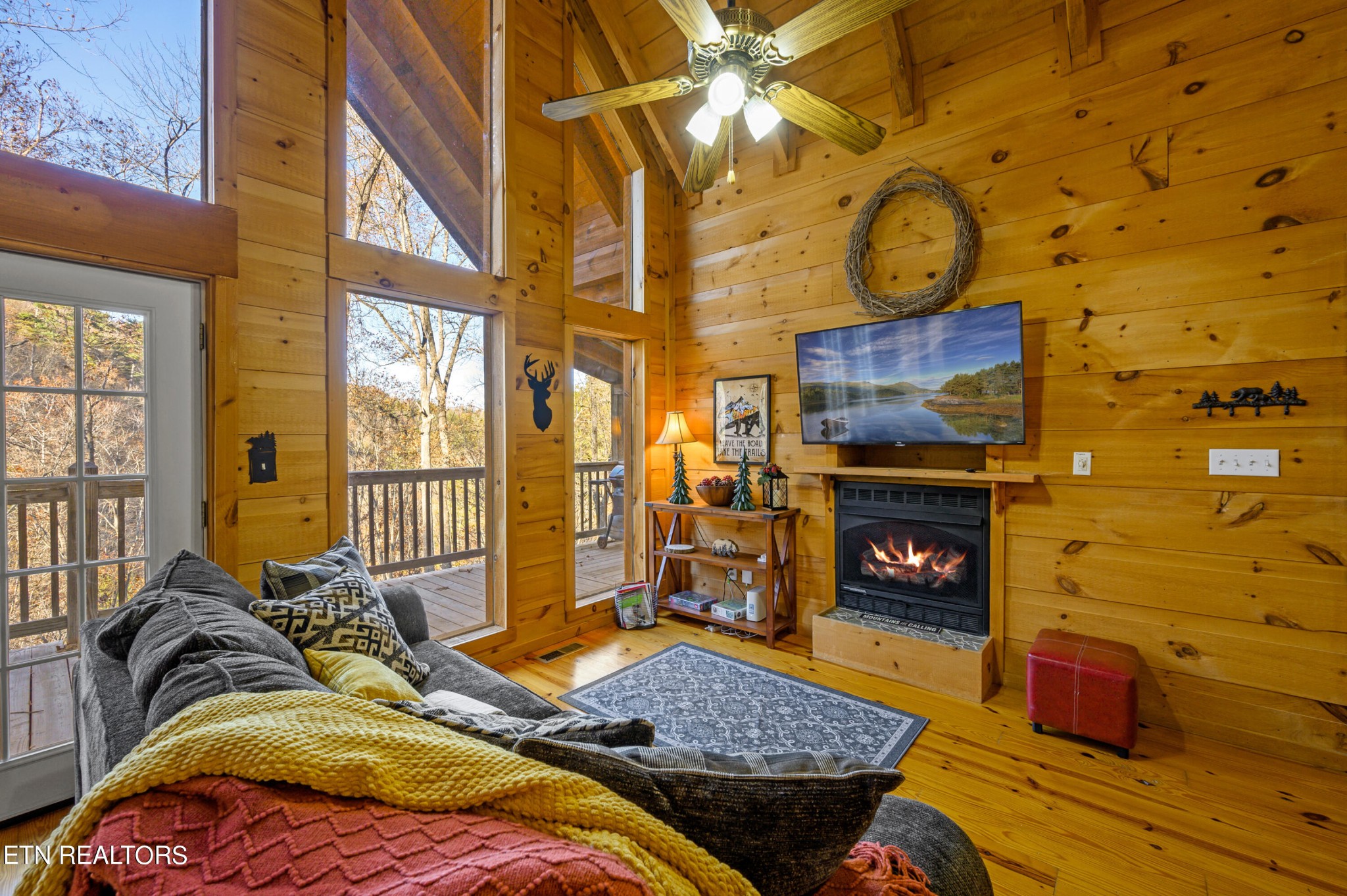 2505 Wildcat Ridge Road Sevierville, TN 37862 - Photo 3 of 48 a bedroom with a bed and a fireplace