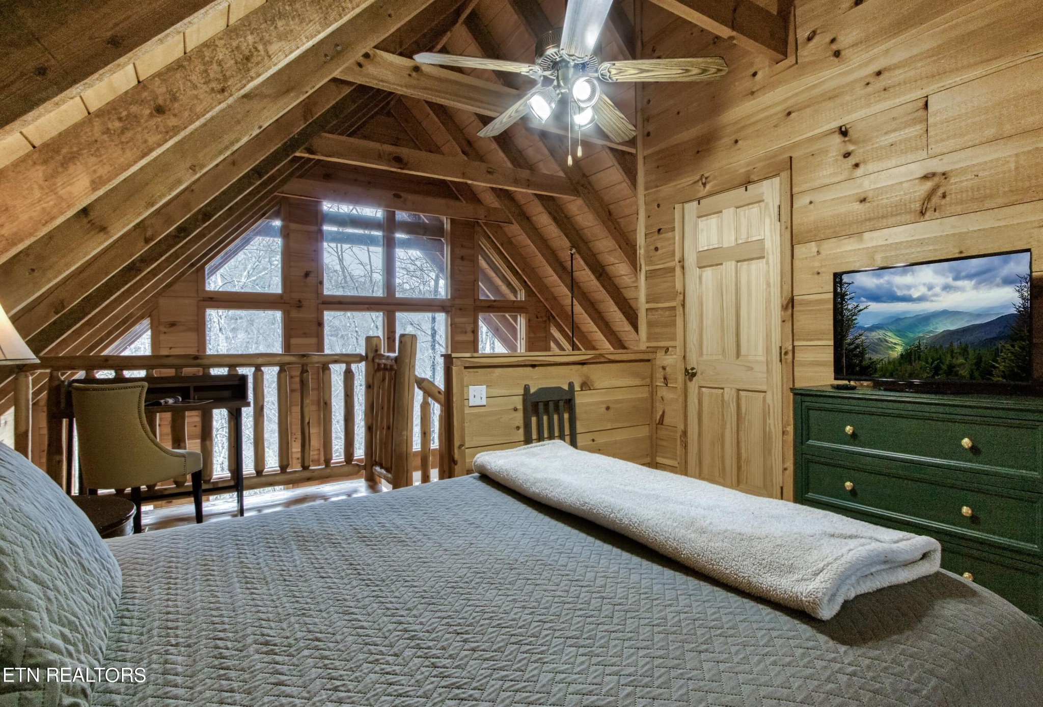 2505 Wildcat Ridge Road Sevierville, TN 37862 - Photo 38 of 48 a bedroom with a bed and a walk in closet