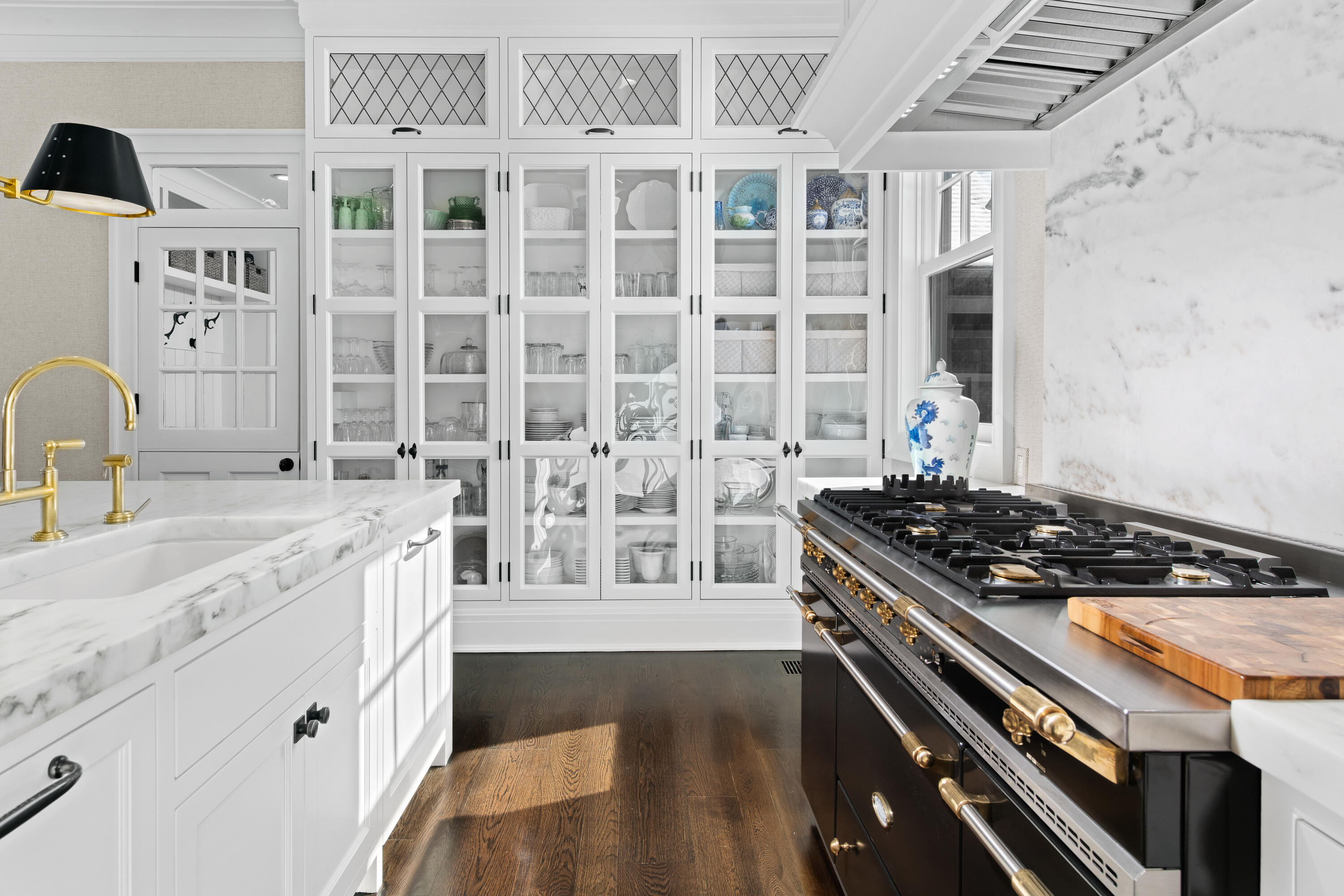 255 Brushy Ridge Road New Canaan, CT 06840 - Photo 12 of 40 a kitchen with stainless steel appliances granite countertop a stove and a sink