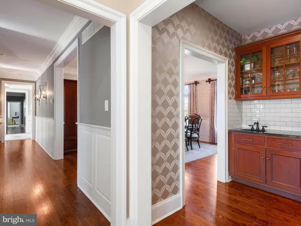 a bedroom with a large bed and a couch