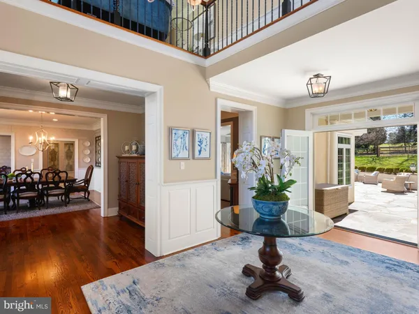 a bath tub sitting in a bathroom next to a window