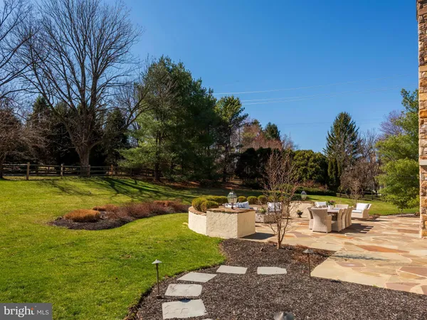 a view of walk in closet with clothes