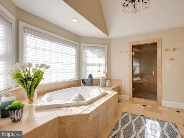 a media room with lots of chairs and a projector screen