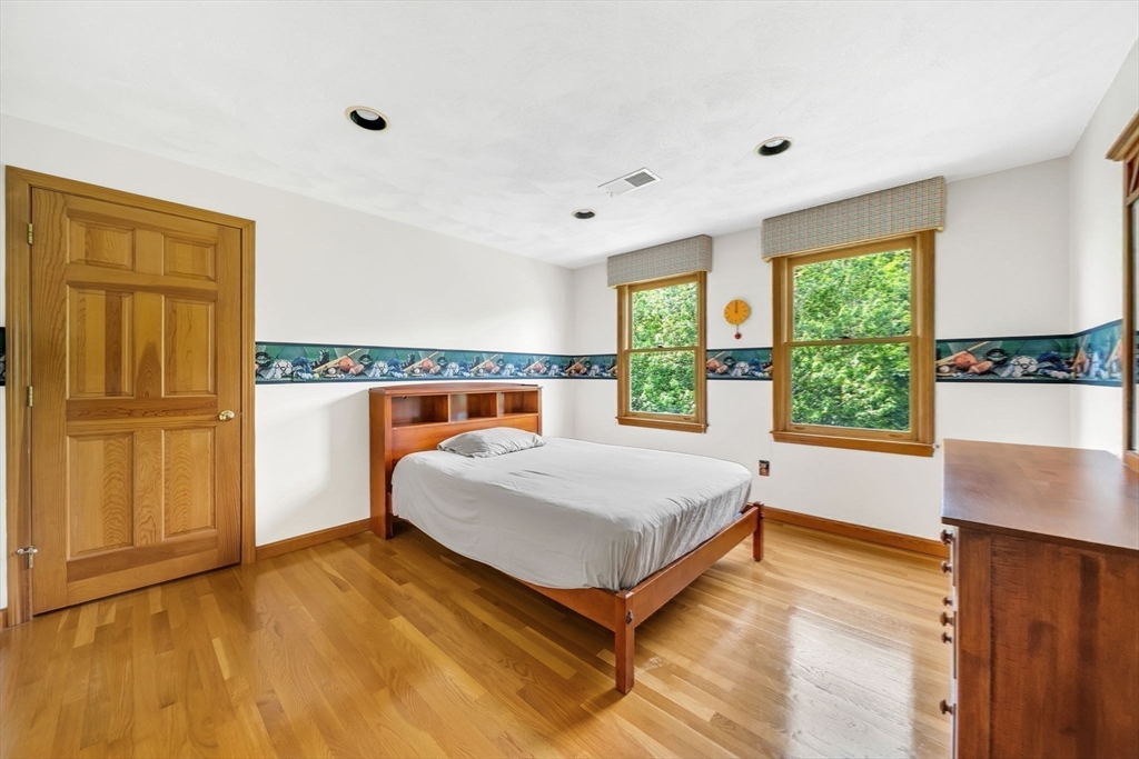 83 Jefferson Road Franklin, MA 02038 - Photo 21 of 34 a bedroom with a bed and a window