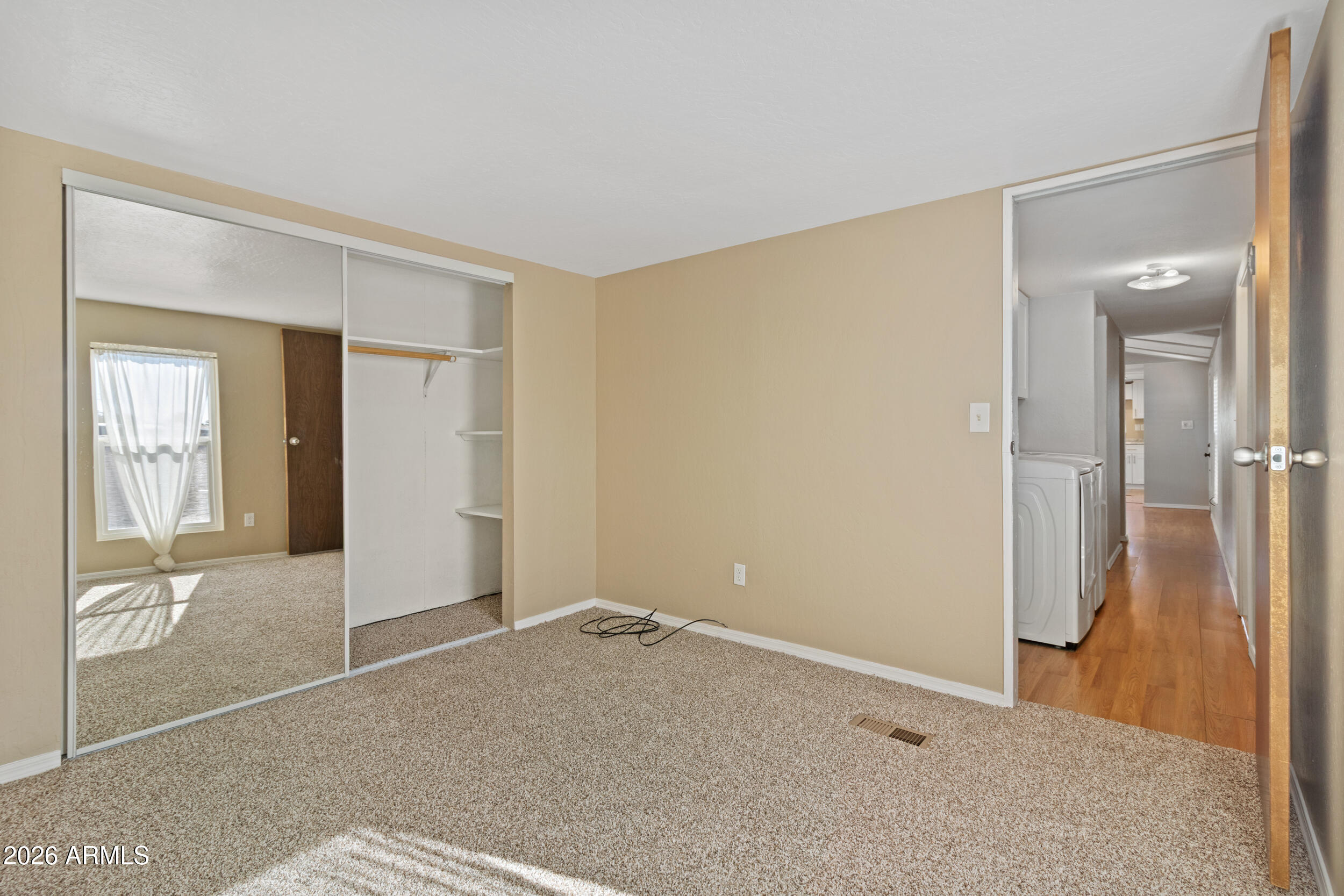 535 South Alma School Road, Unit 69 Mesa, AZ 85210 - Photo 19 of 59 a view of livingroom with wooden floor and bathroom