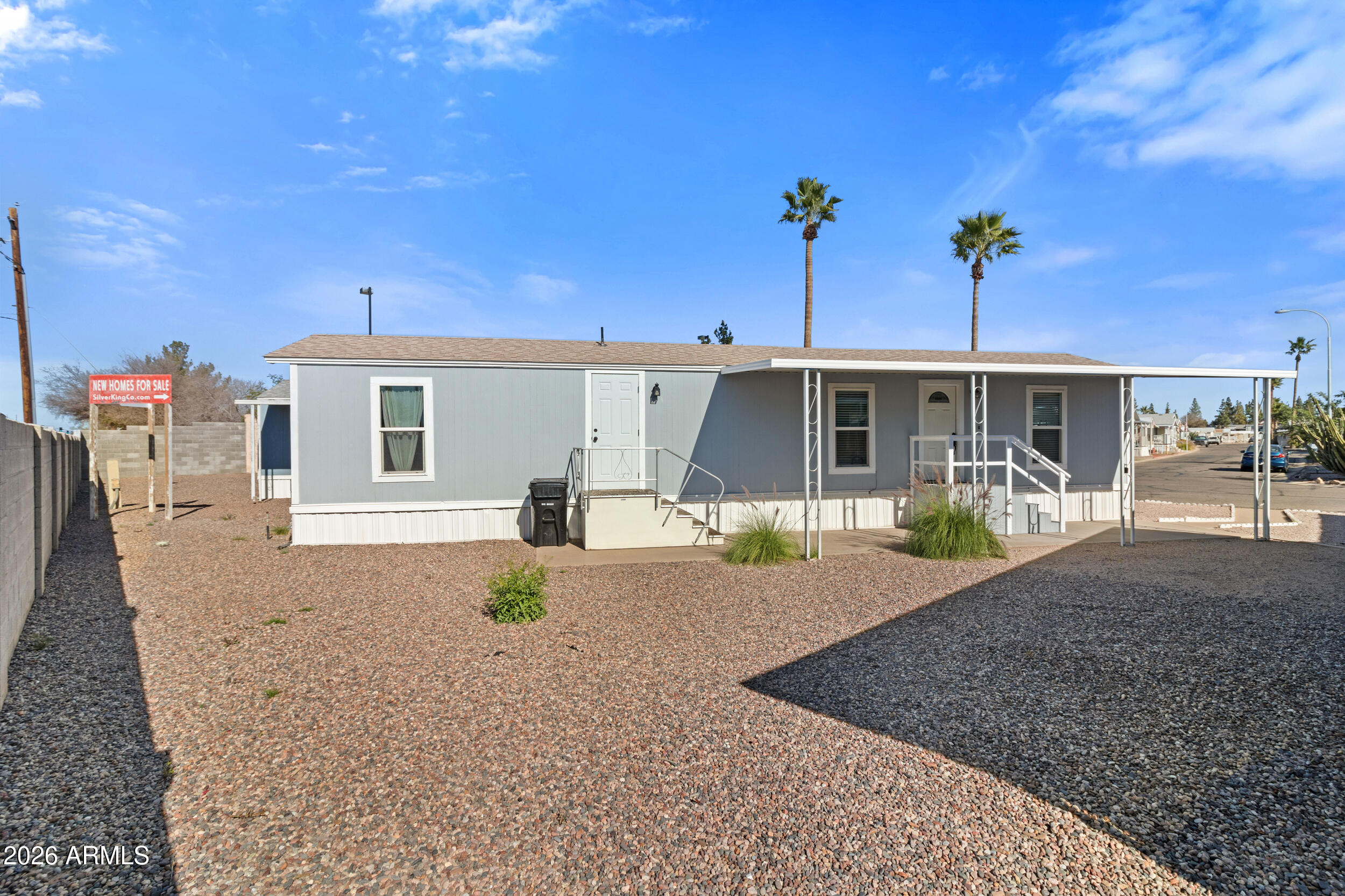 535 South Alma School Road, Unit 69 Mesa, AZ 85210 - Photo 22 of 59 a front view of a house with porch