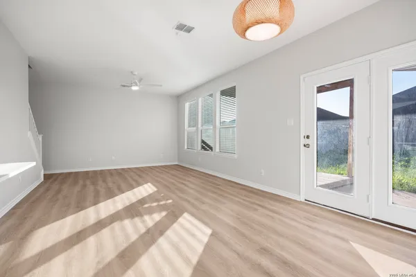 a view of an empty room and window