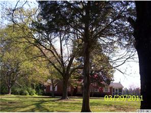4710 Beatties Ford Road Charlotte, NC 28216 - Photo 1 of 6 a view of a large trees with a tree