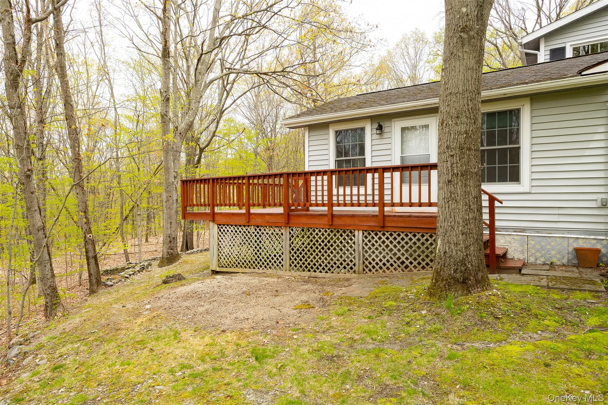 33 Willow Brook Ridge Clinton Corners, NY 12514 - Photo 45 of 50 a view of a house with a fence and a tree