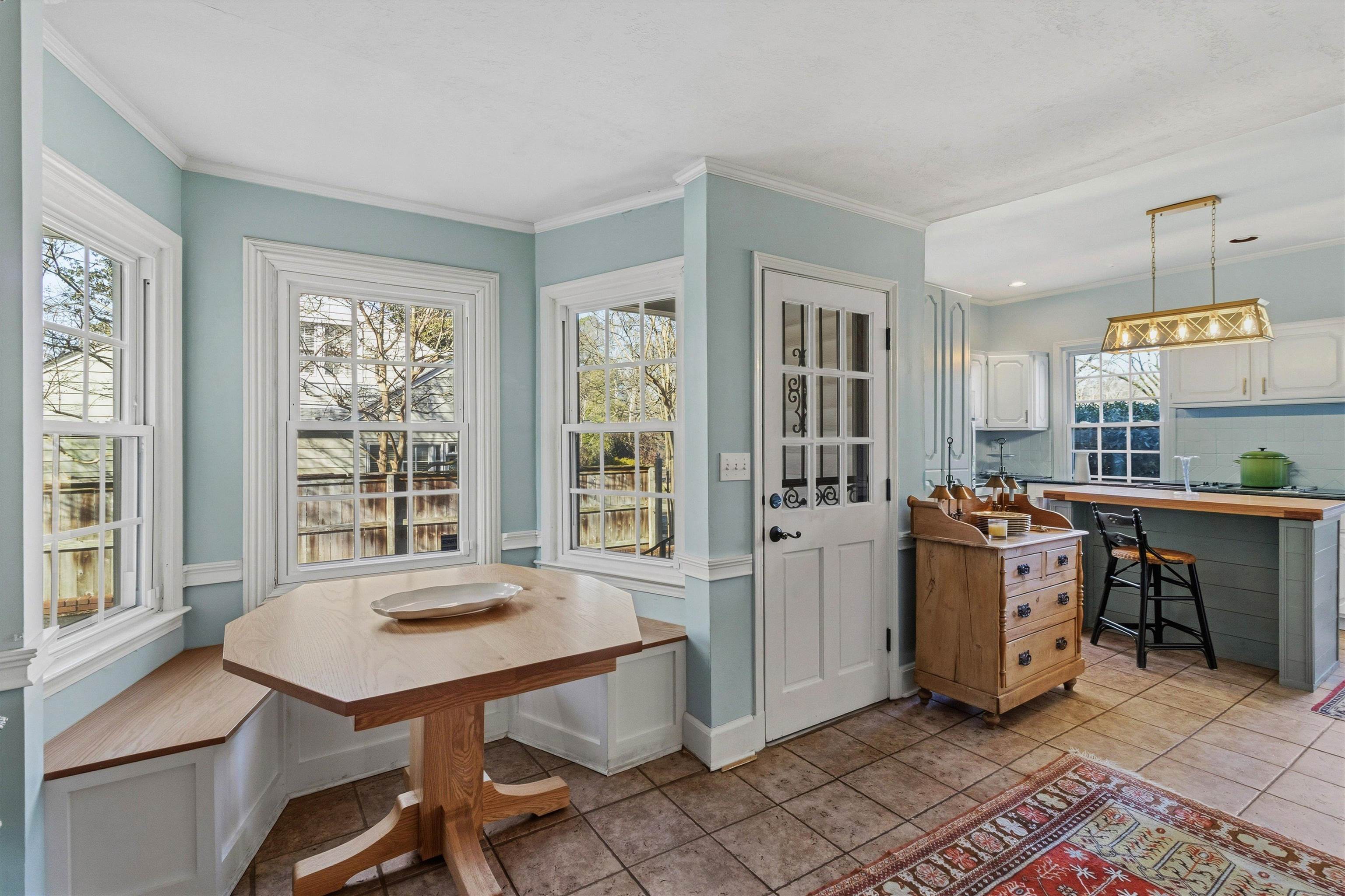 4009 Walnut Grove Road Memphis, TN 38117 - Photo 14 of 38 Dining area featuring light tile patterned flooring and ornamental molding