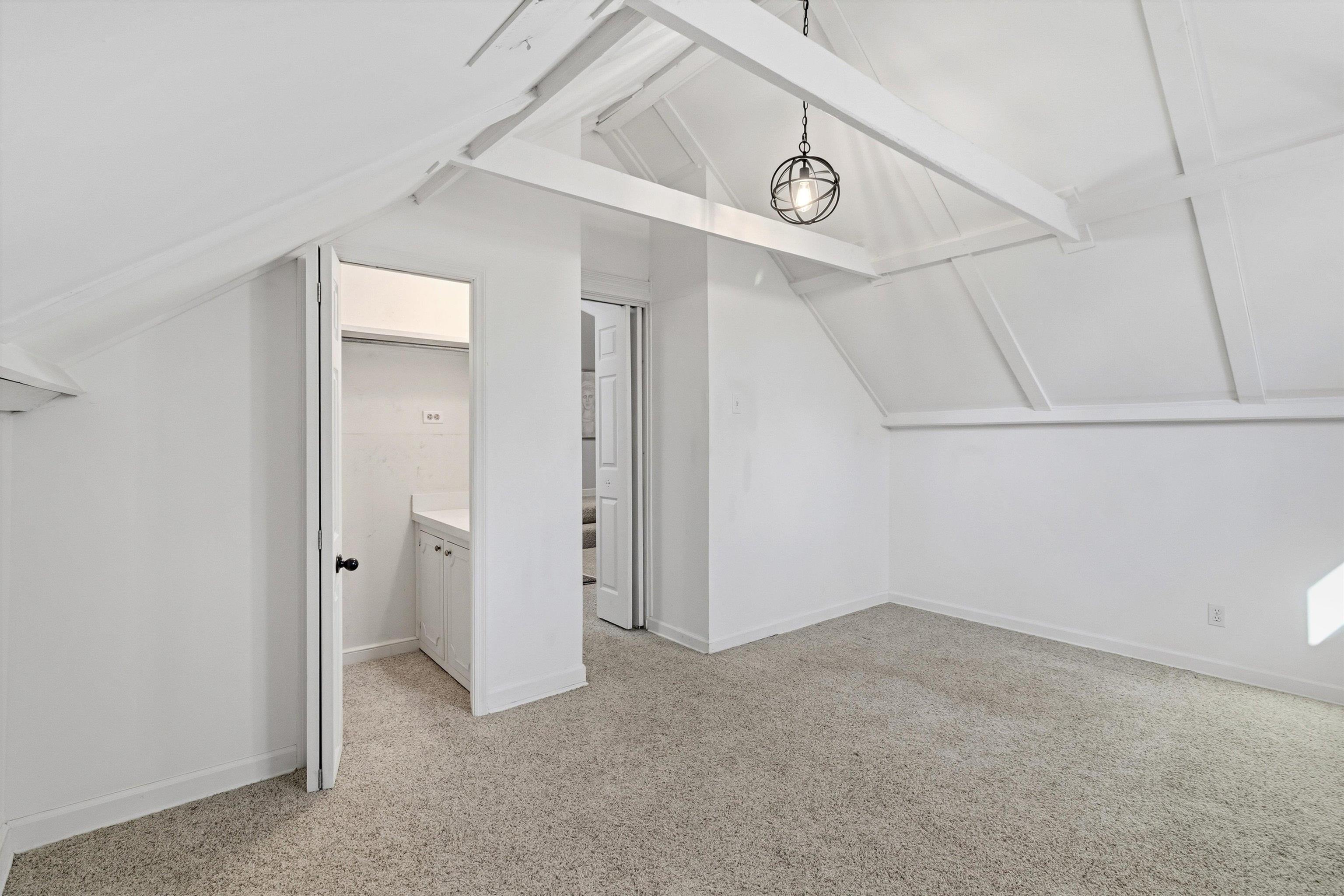 4009 Walnut Grove Road Memphis, TN 38117 - Photo 28 of 38 Bonus room featuring light colored carpet and baseboards