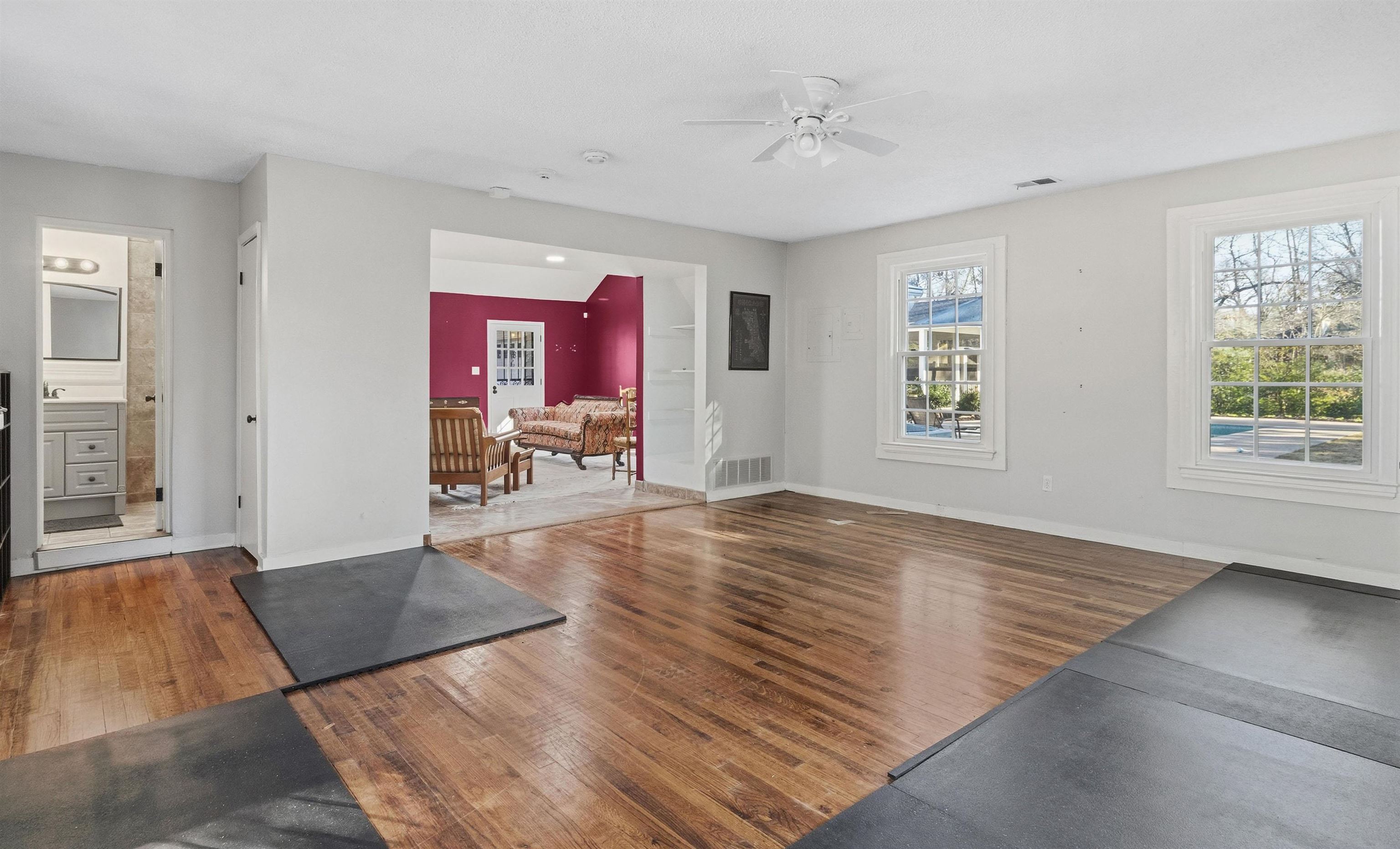 4009 Walnut Grove Road Memphis, TN 38117 - Photo 36 of 38 Workout room with hardwood / wood-style floors and ceiling fan