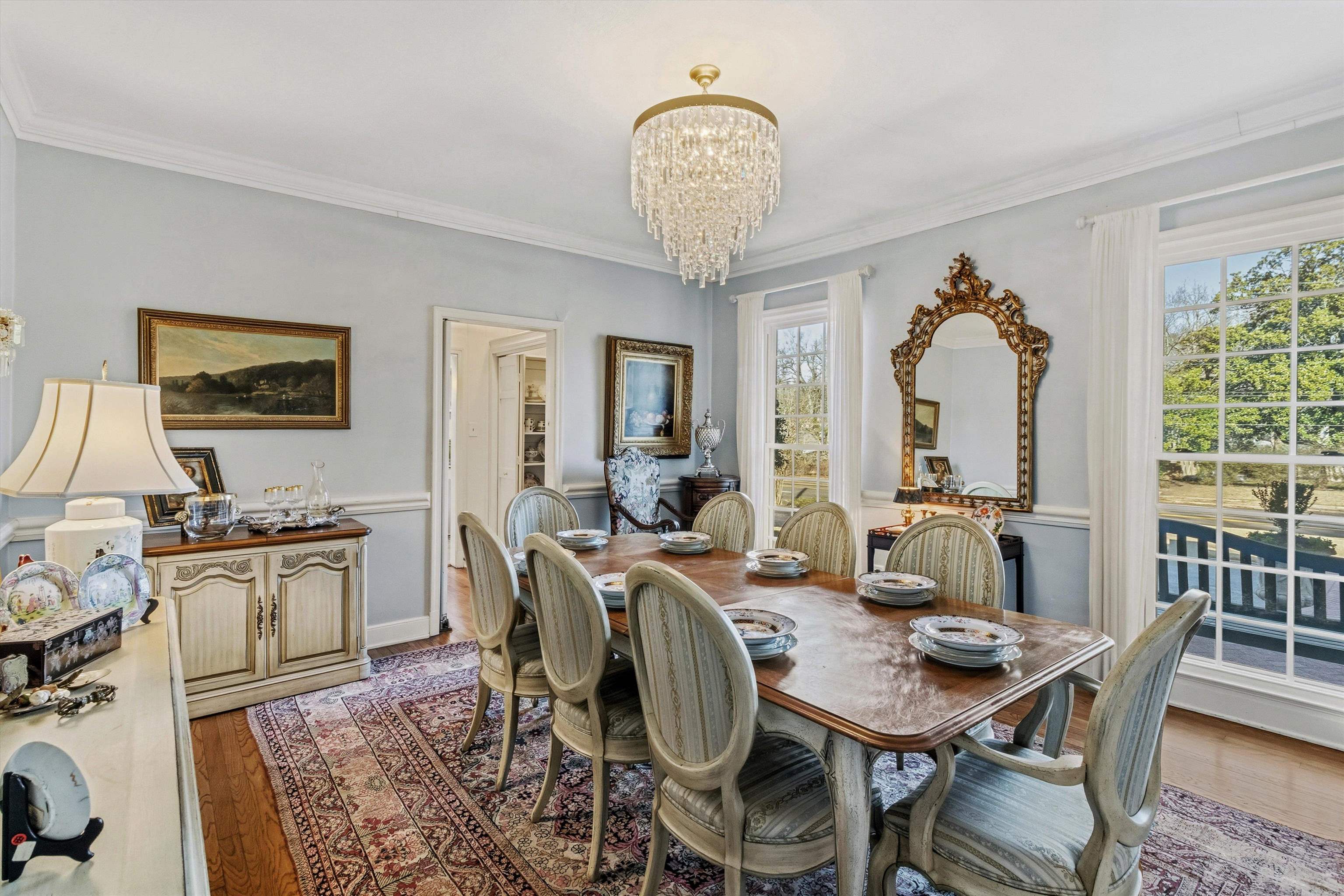 4009 Walnut Grove Road Memphis, TN 38117 - Photo 7 of 38 Dining space with a chandelier, wood finished floors, and ornamental molding