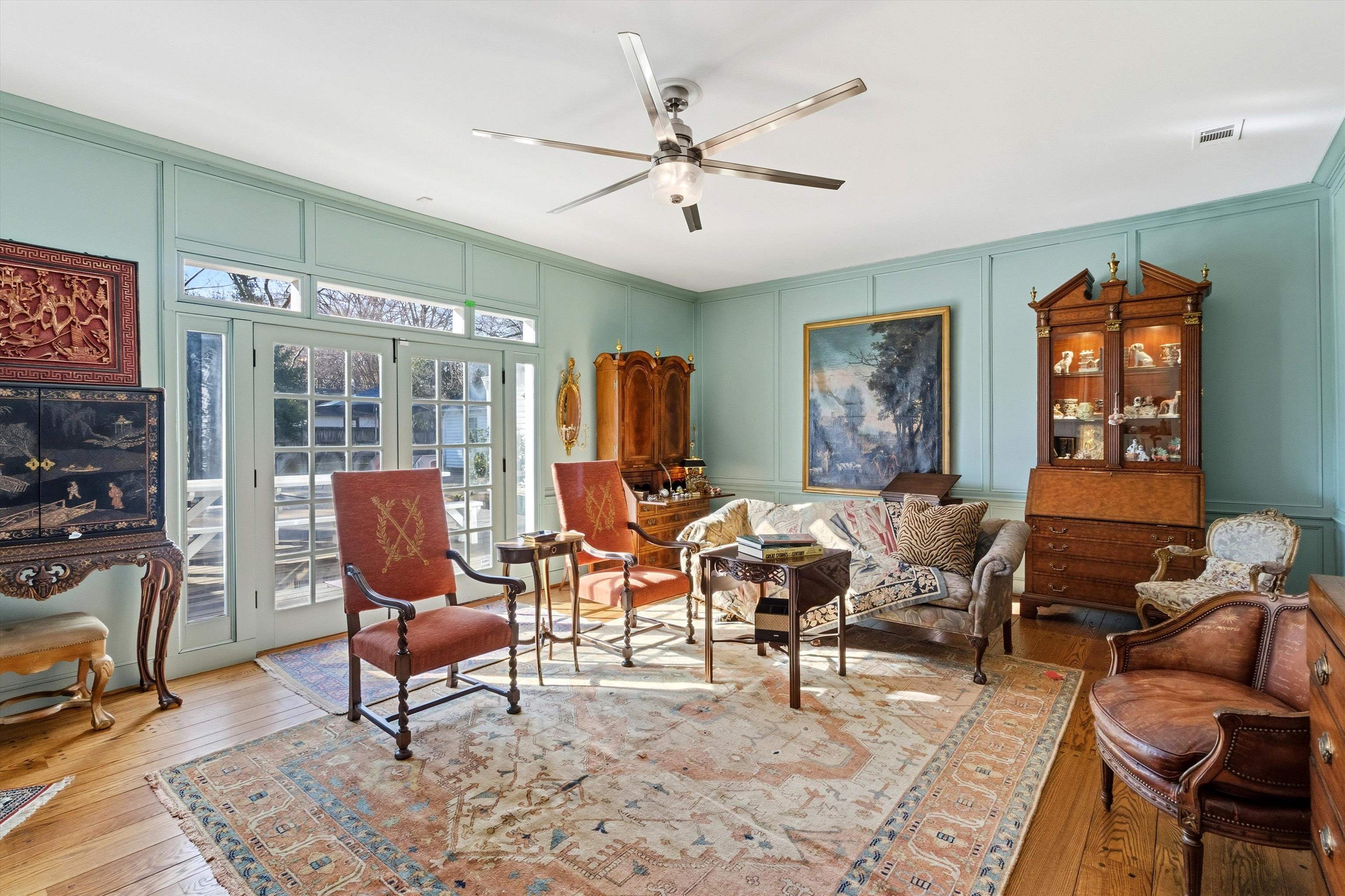 4009 Walnut Grove Road Memphis, TN 38117 - Photo 10 of 38 Living area with a decorative wall, hardwood / wood-style floors, and ceiling fan
