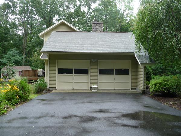 223 Three Rivers Road Wilbraham, MA 01095 - Photo 17 of 19 a front view of a house with a yard