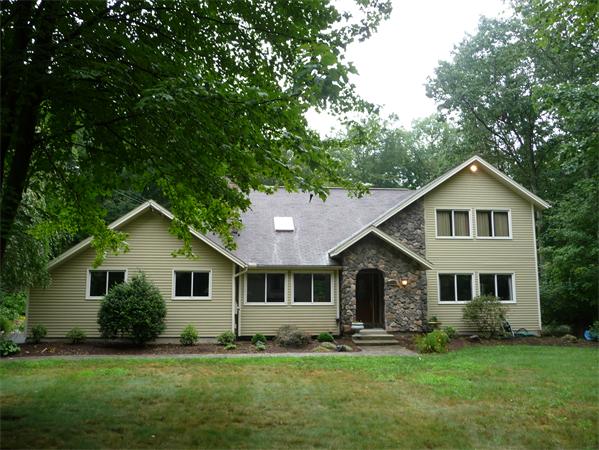 223 Three Rivers Road Wilbraham, MA 01095 - Photo 18 of 19 a front view of a house with a yard