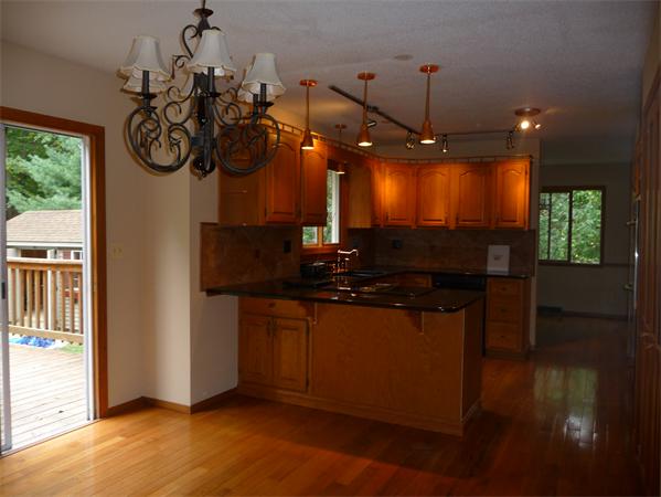 223 Three Rivers Road Wilbraham, MA 01095 - Photo 3 of 19 a kitchen with stainless steel appliances granite countertop a stove a sink and a window