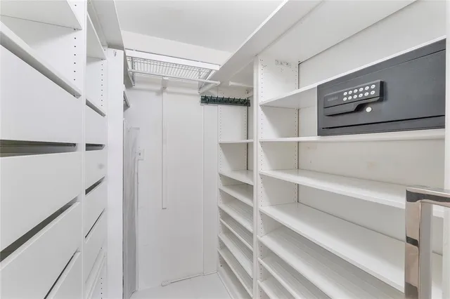 a view of an empty walk in closet