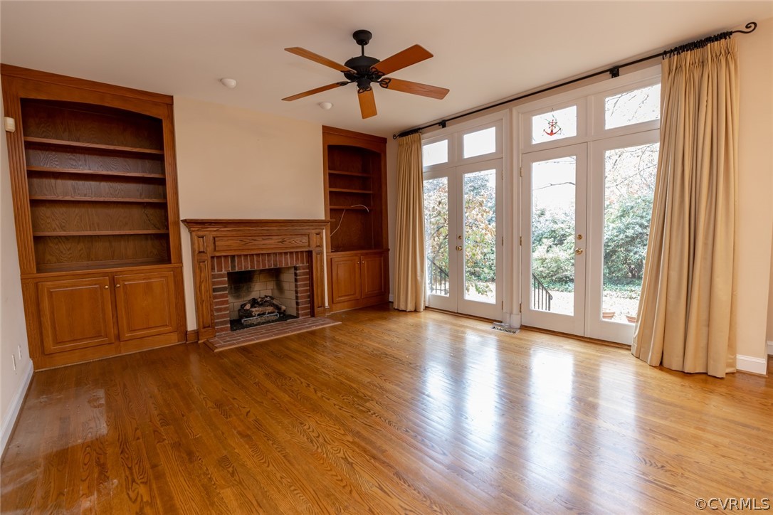 110 Penshurst Road Richmond, VA 23221 - Photo 23 of 39 The family room features a masonry fireplace with