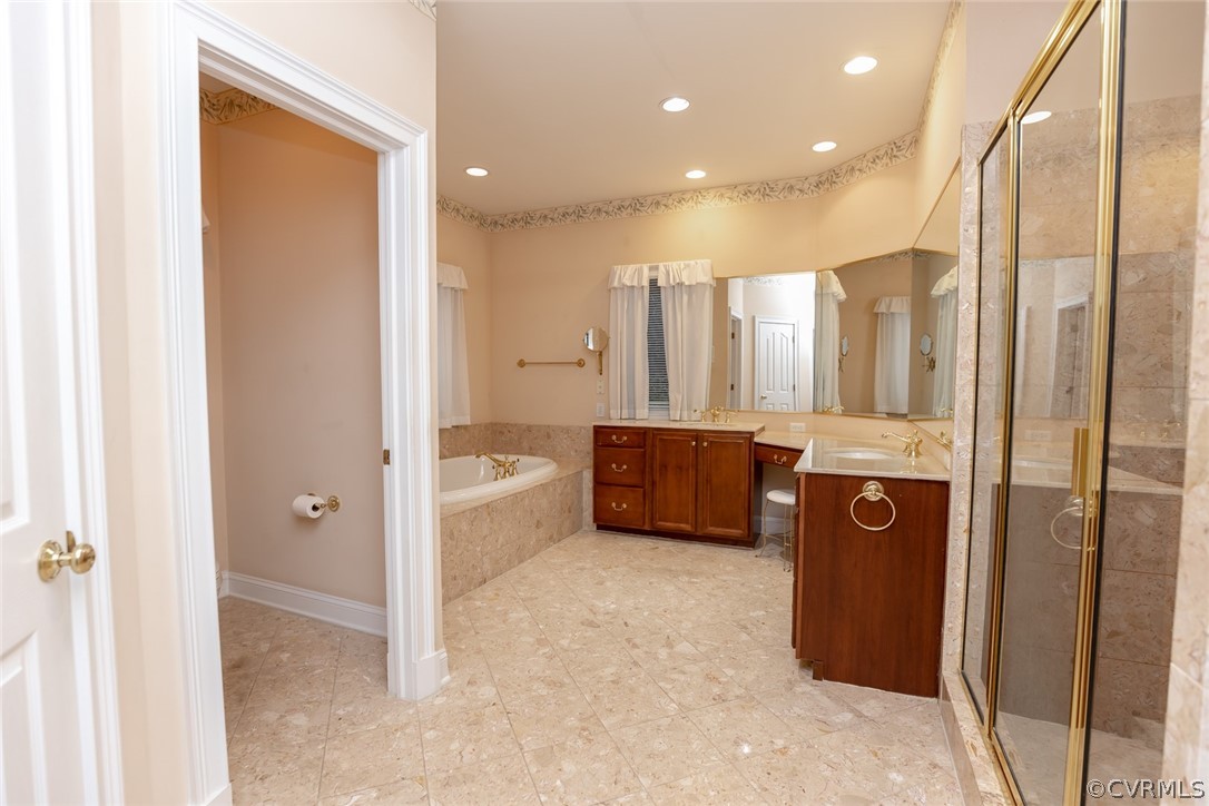 110 Penshurst Road Richmond, VA 23221 - Photo 28 of 39 The master bath has a marble floor, cherry double