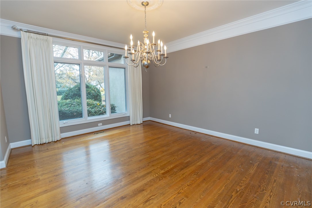 View of the formal dining room with hardwood floor