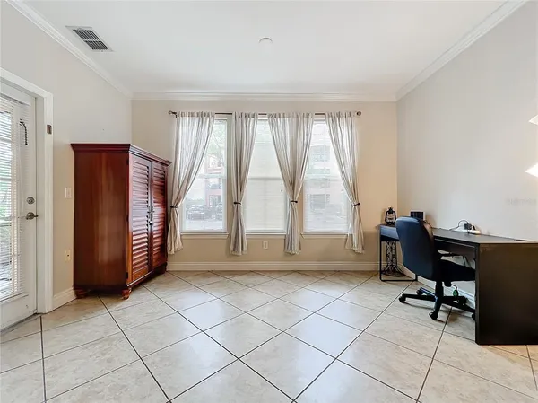 a view of workspace with windows and air conditioner