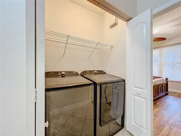 a utility room with dryer and washer