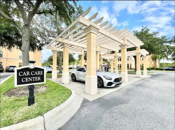 a view of a car park in front of a building
