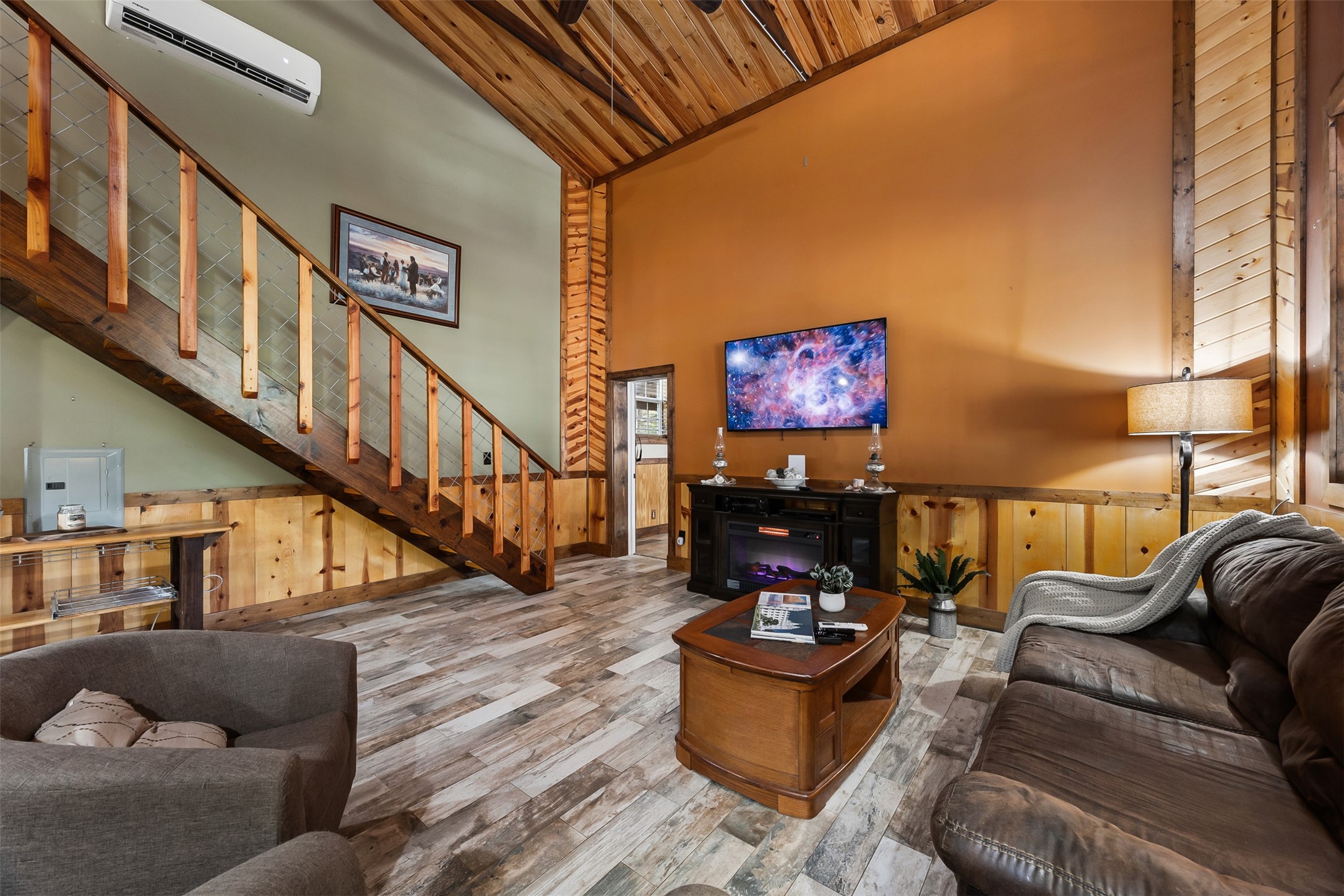 40 Olson Road New Waverly, TX 77358 - Photo 11 of 34 a living room with furniture or stairs and a couch