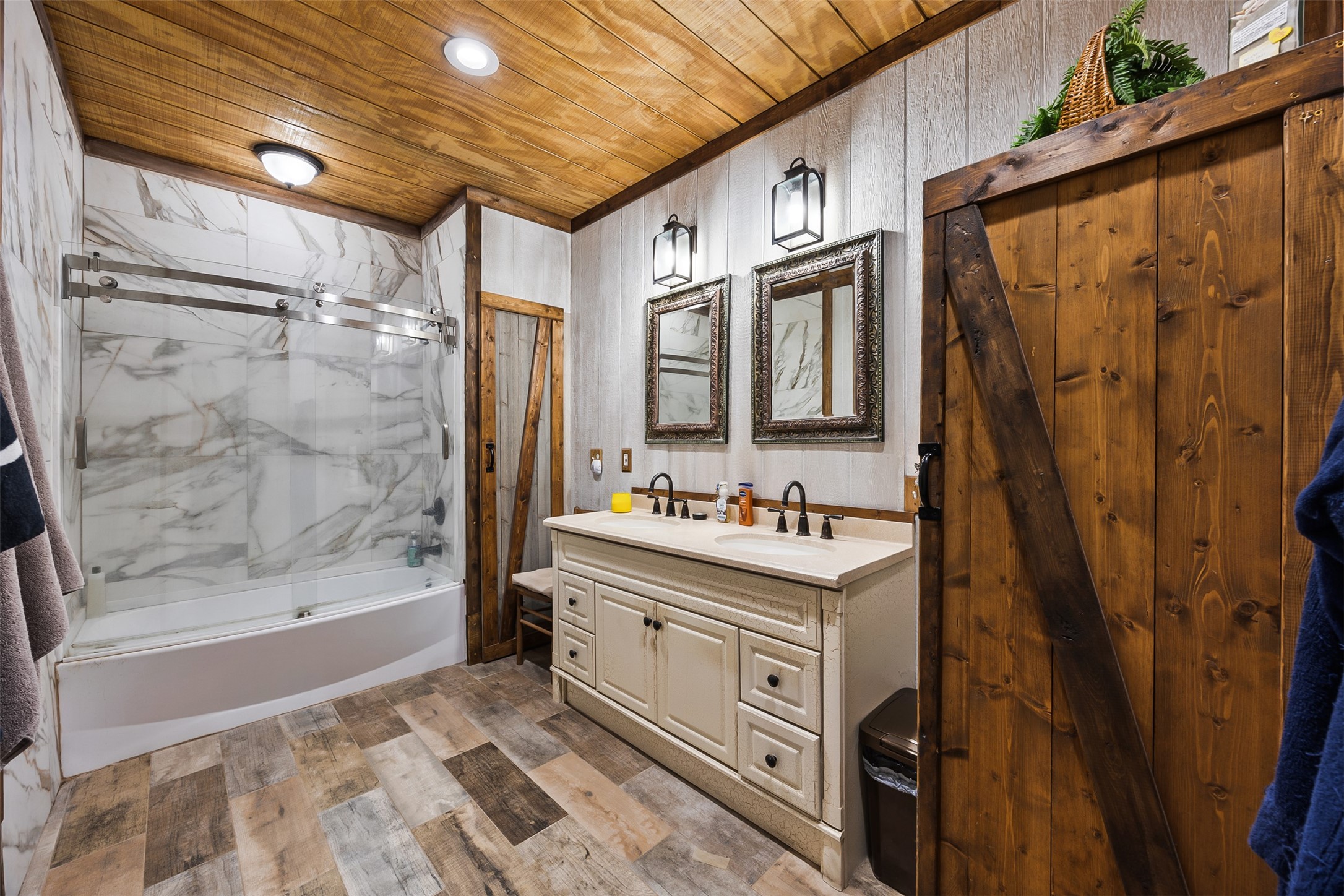 40 Olson Road New Waverly, TX 77358 - Photo 15 of 34 a bathroom with a bathtub and a shower