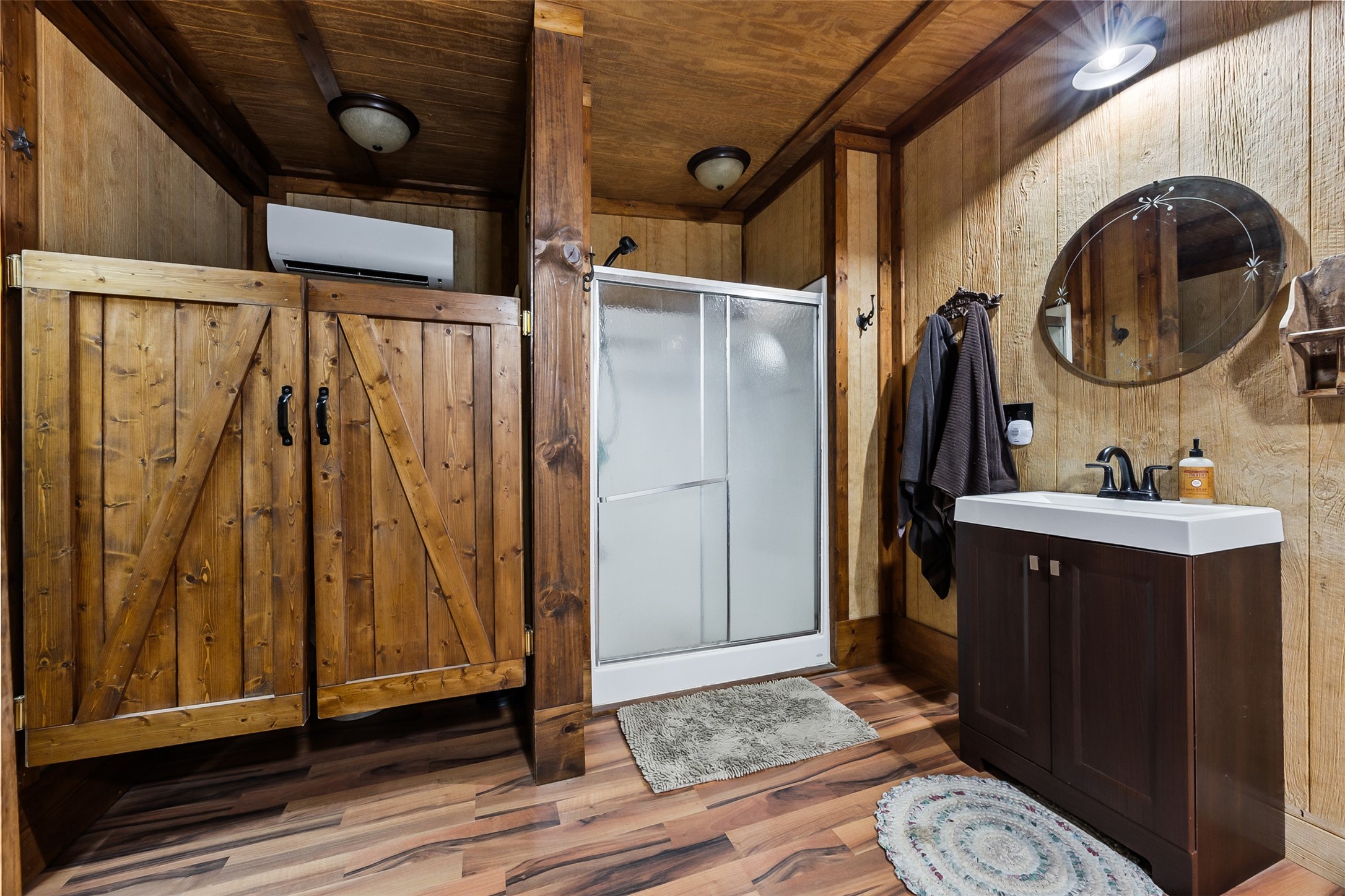 40 Olson Road New Waverly, TX 77358 - Photo 17 of 34 a bathroom with a sink and a mirror
