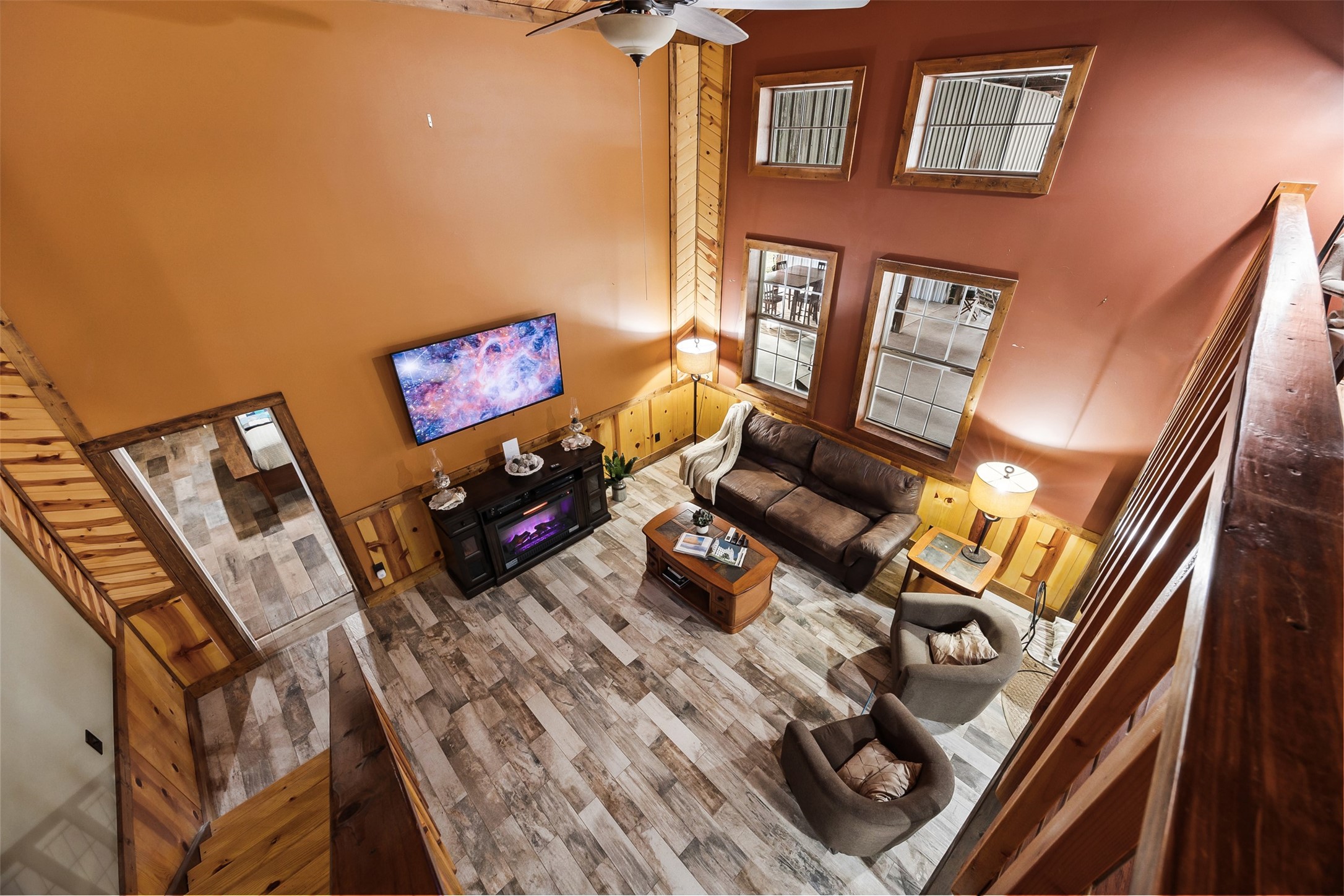 40 Olson Road New Waverly, TX 77358 - Photo 21 of 34 a living room with furniture and a flat screen tv