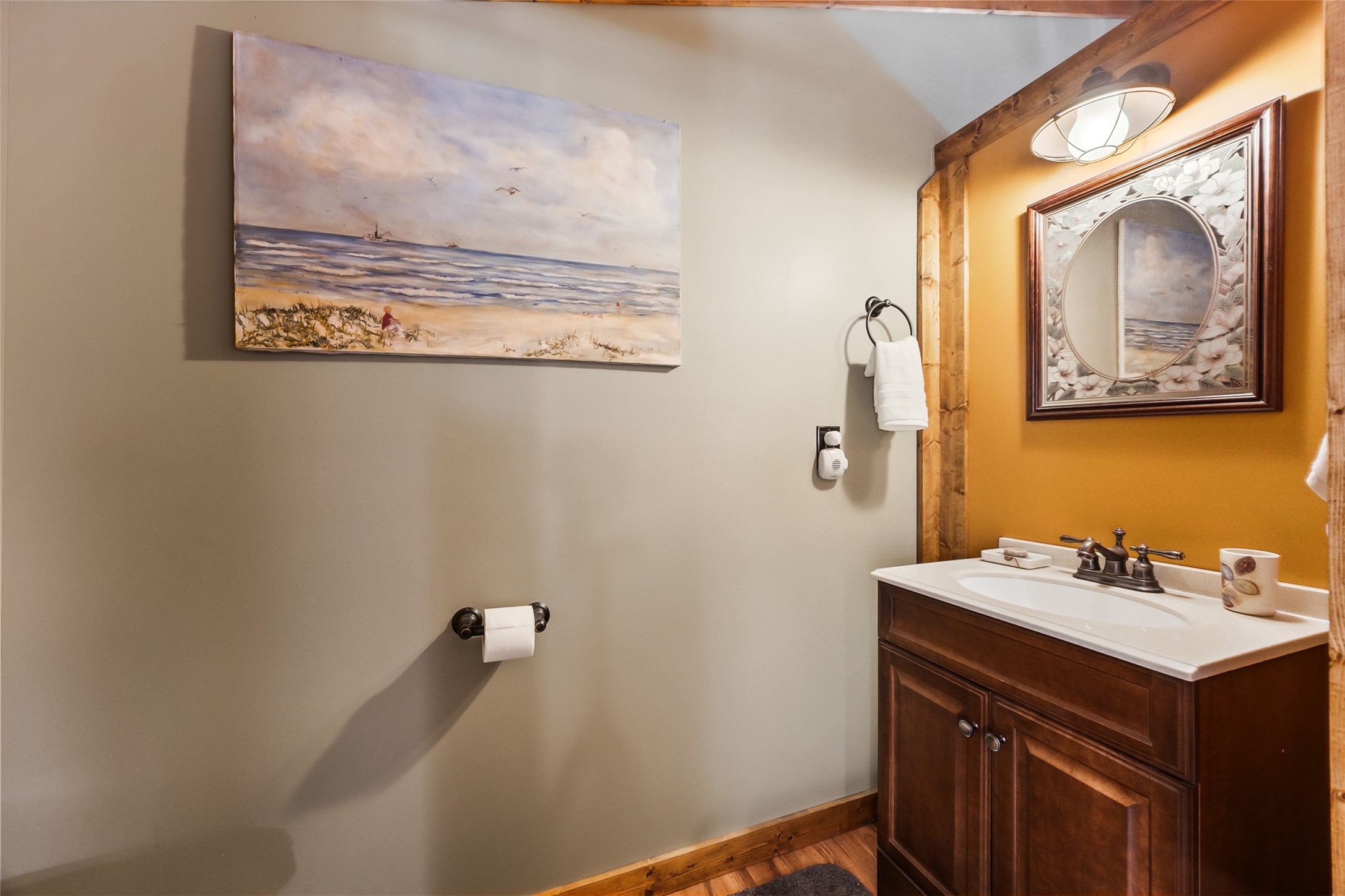 40 Olson Road New Waverly, TX 77358 - Photo 23 of 34 a bathroom with a sink mirror and vanity