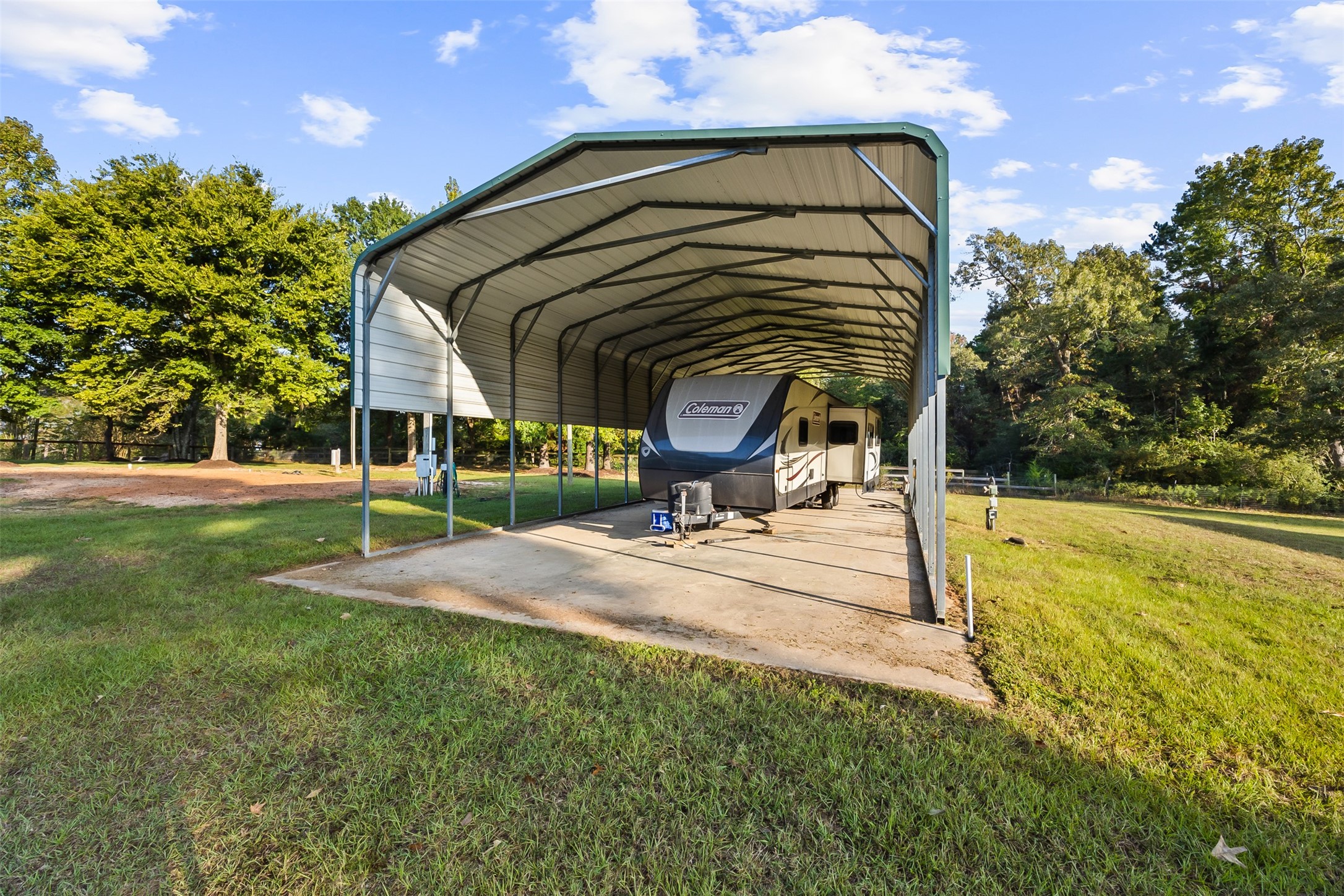 40 Olson Road New Waverly, TX 77358 - Photo 25 of 34 a view of a house with a swimming pool