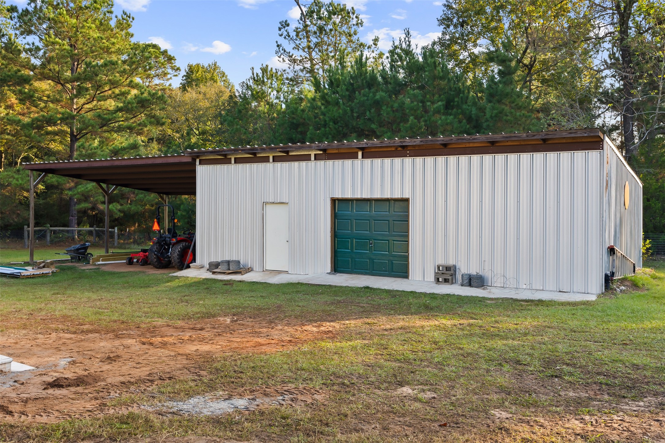 40 Olson Road New Waverly, TX 77358 - Photo 26 of 34 a view of a house with backyard and garden