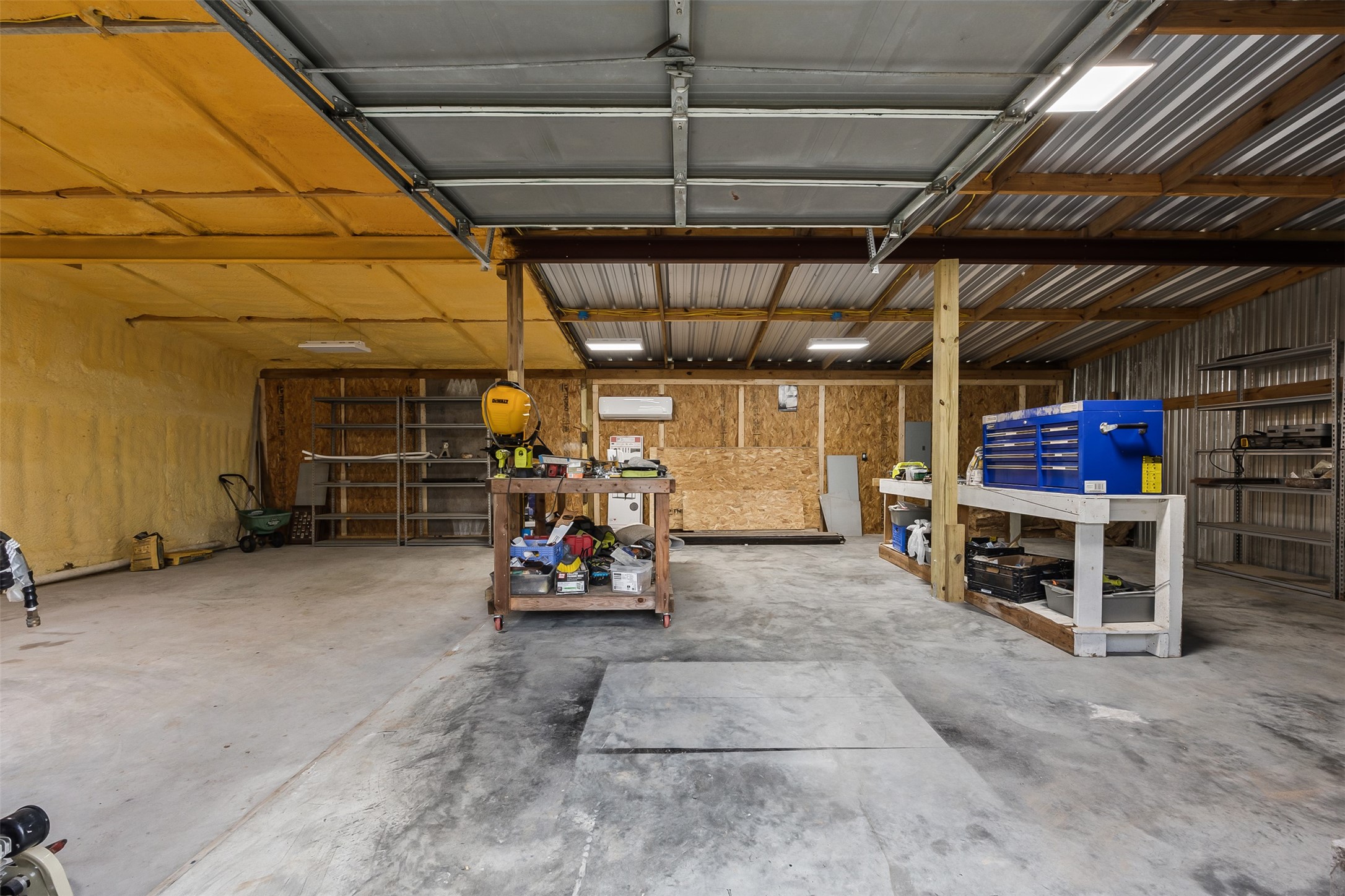 40 Olson Road New Waverly, TX 77358 - Photo 27 of 34 a view of a storage room with racks