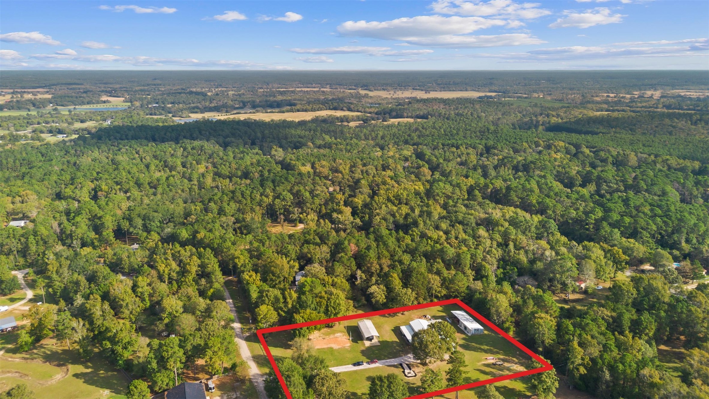 40 Olson Road New Waverly, TX 77358 - Photo 29 of 34 a view of an outdoor space with a lake view