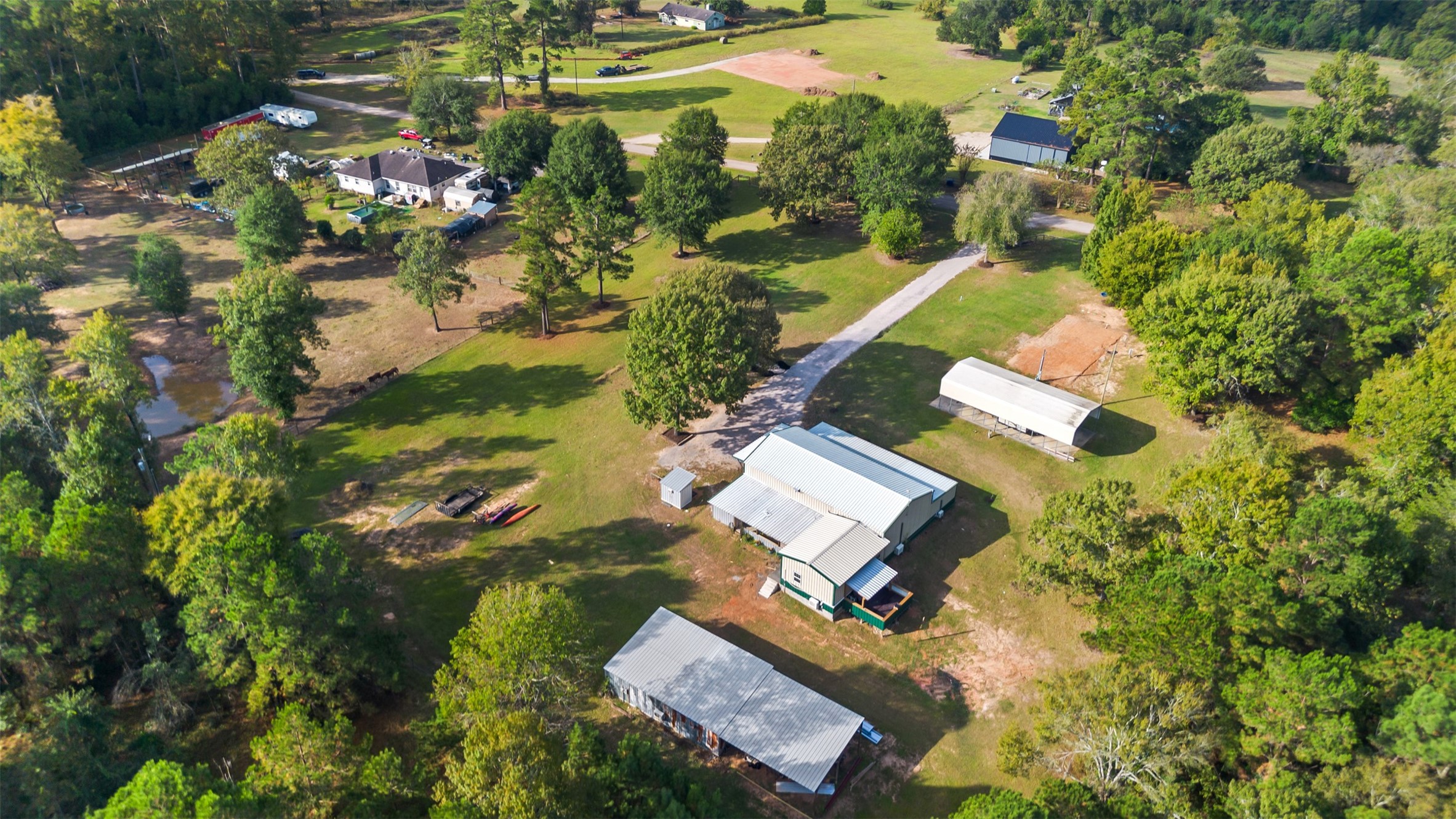 40 Olson Road New Waverly, TX 77358 - Photo 30 of 34 an aerial view of residential house with outdoor space