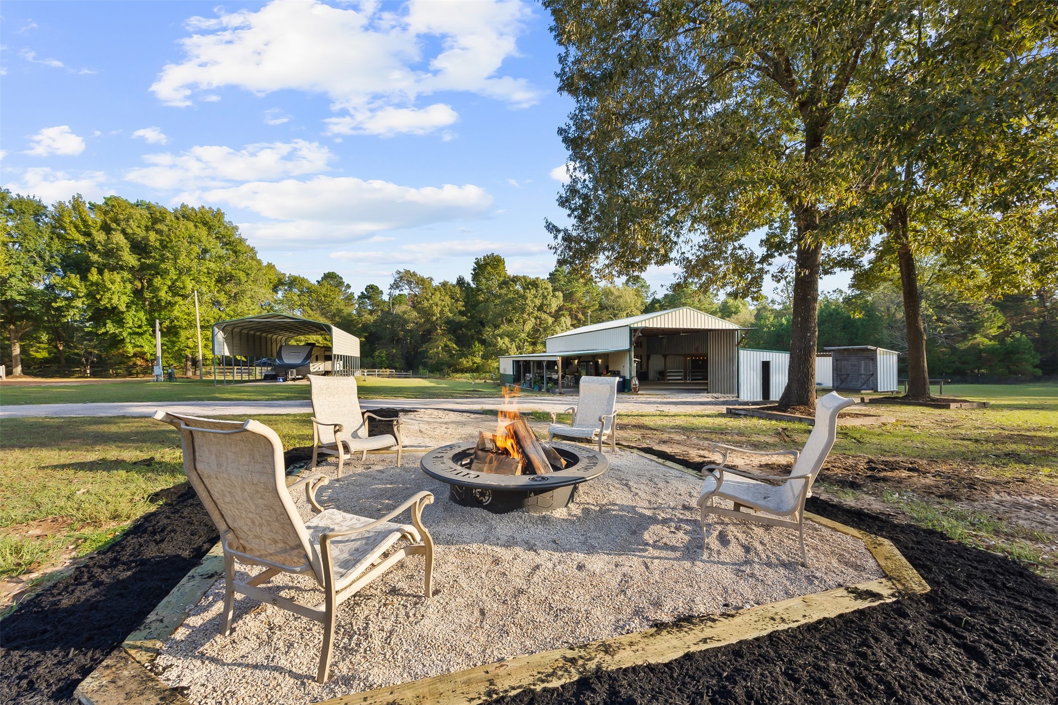 40 Olson Road New Waverly, TX 77358 - Photo 3 of 34 a view of a swimming pool with a patio