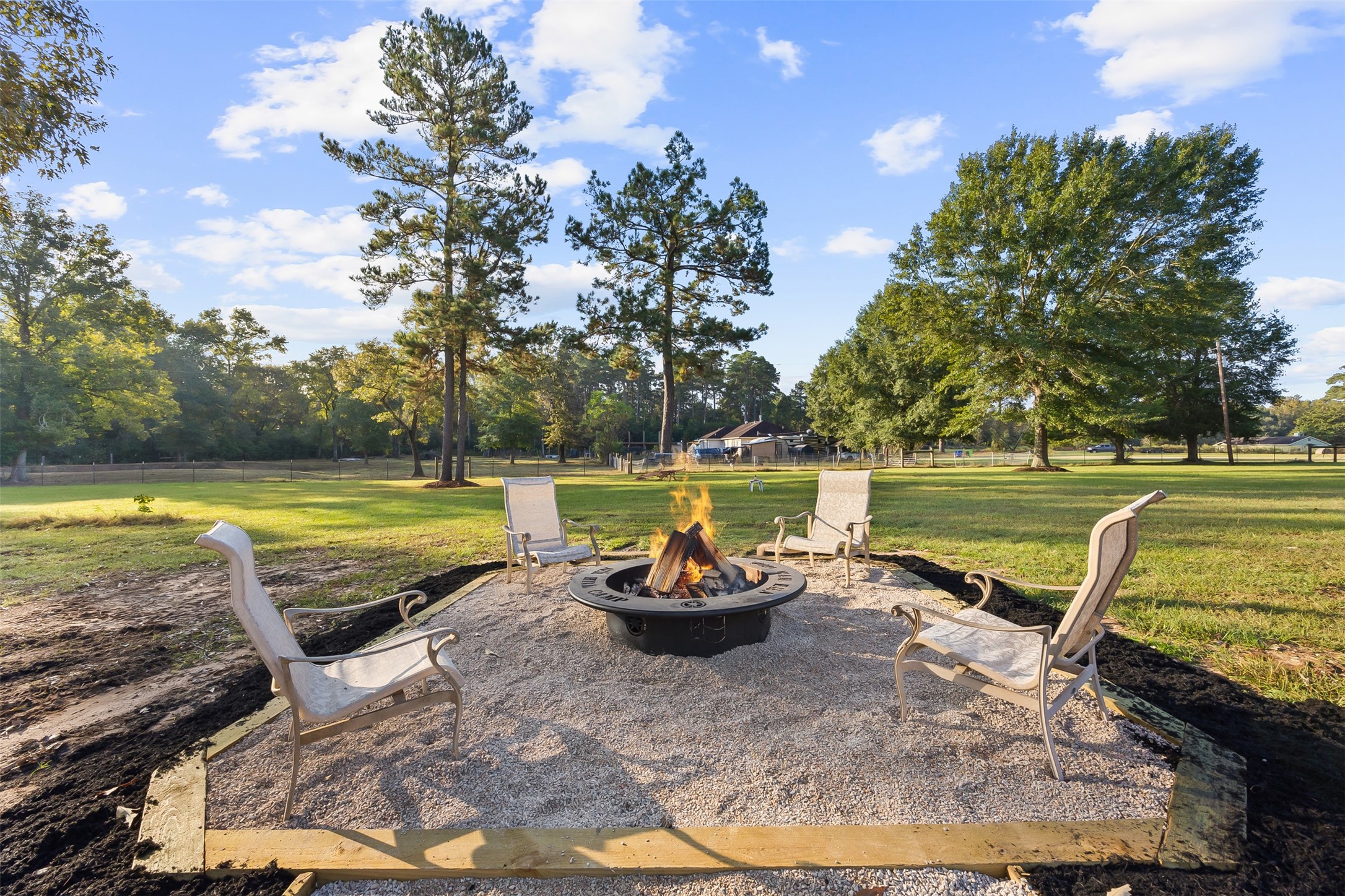 40 Olson Road New Waverly, TX 77358 - Photo 4 of 34 a view of a swimming pool and lounge chair
