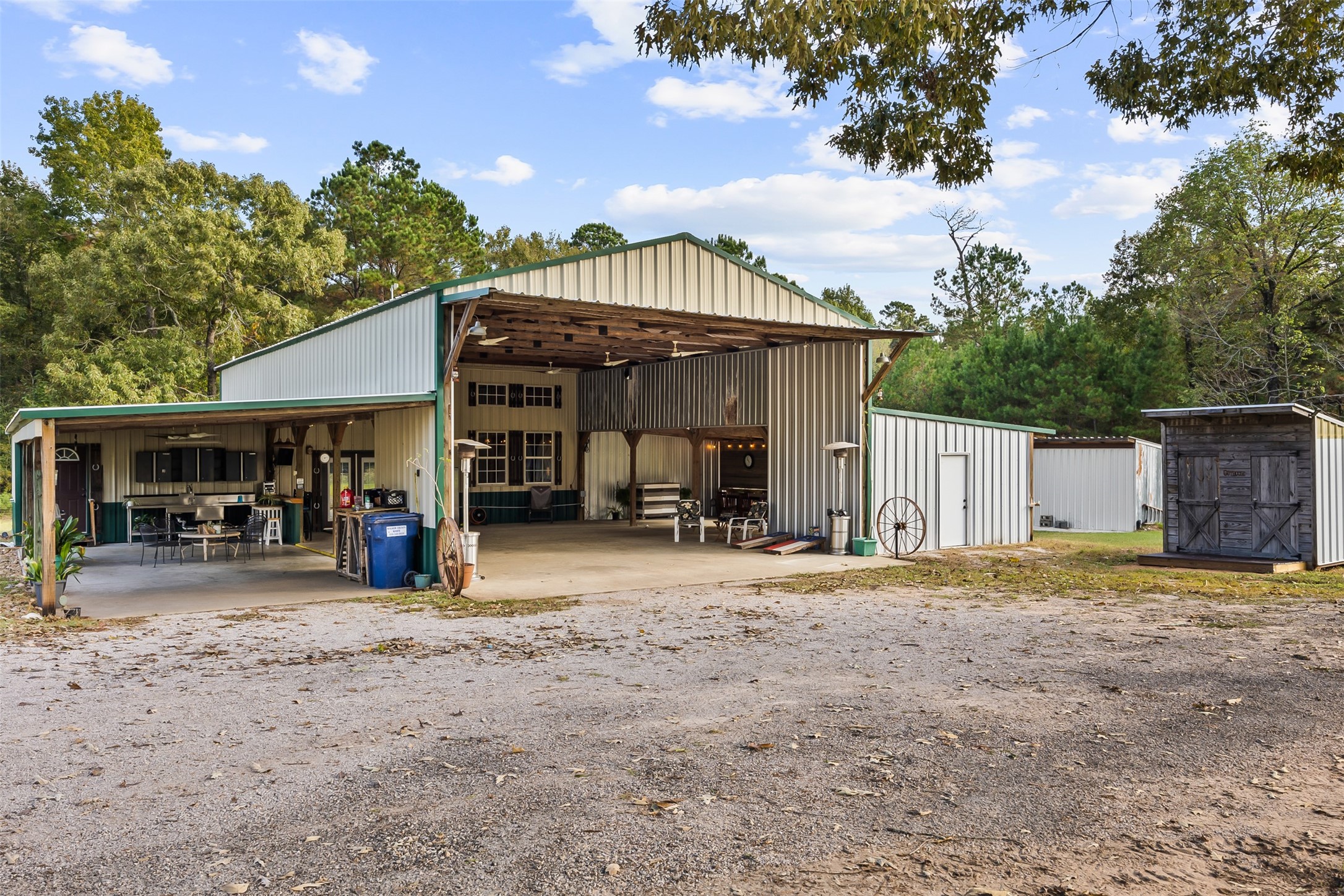 40 Olson Road New Waverly, TX 77358 - Photo 5 of 34 a view of a house with a porch and a tree