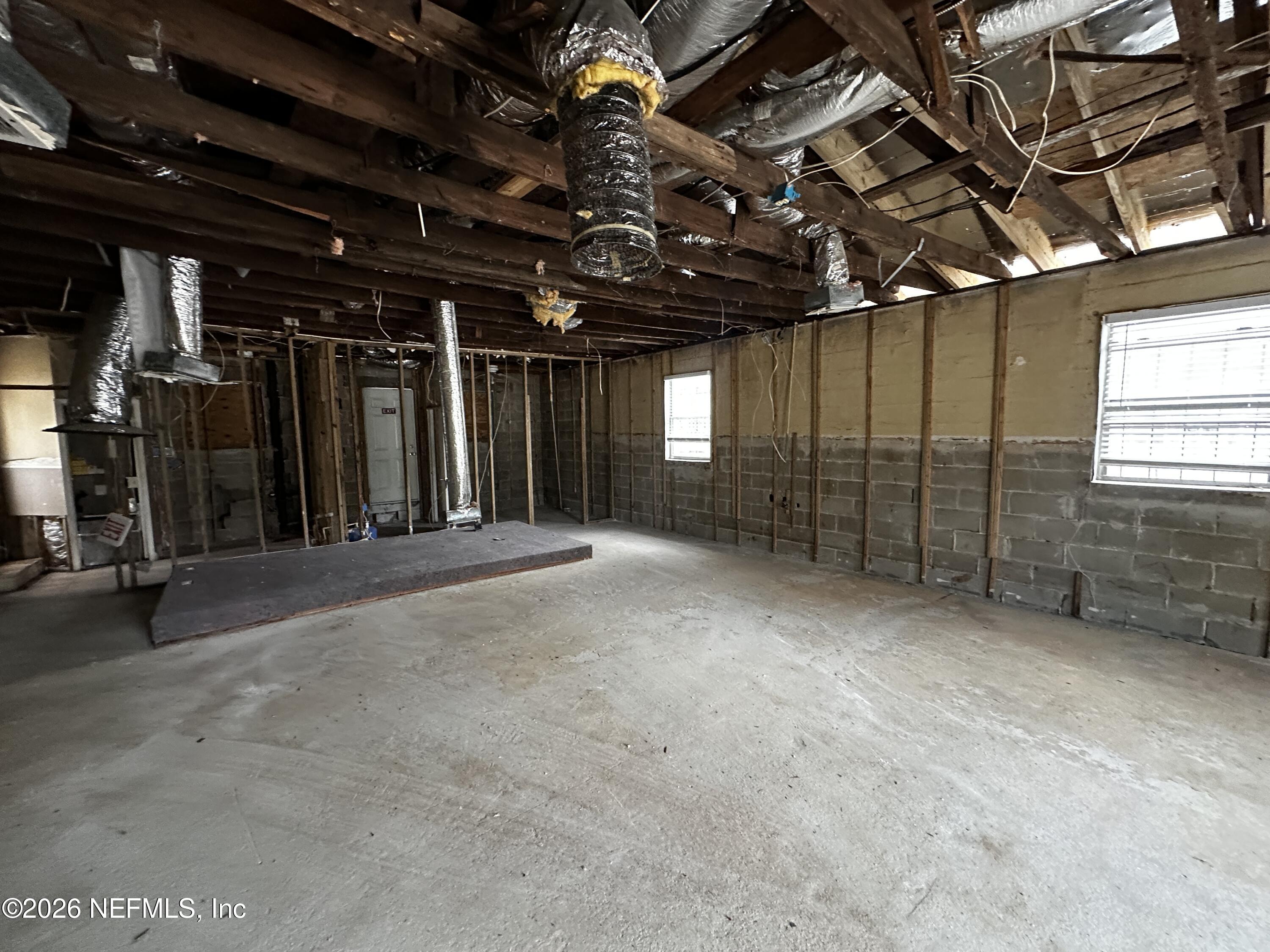 2004 Benedict Road Jacksonville, FL 32209 - Photo 5 of 16 a view of an empty room with wooden walls