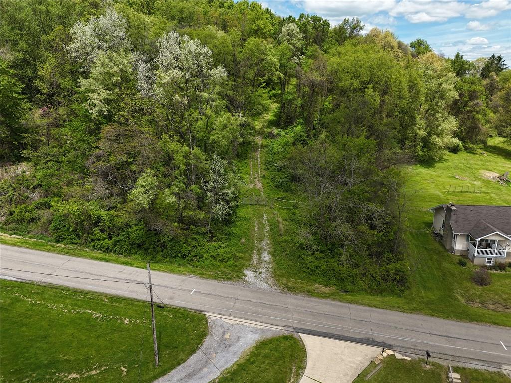 217 Briar Hill Road Kittanning, PA 16201 - Photo 6 of 11 a view of a back yard from a balcony